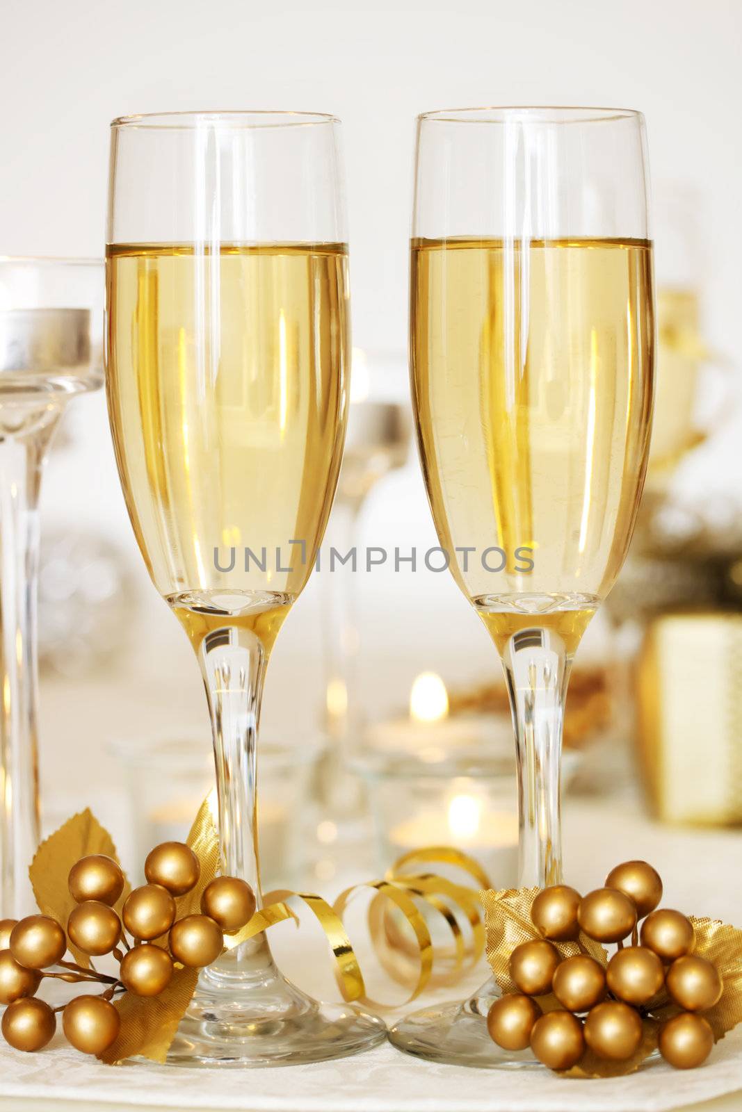 Two champagne glasses on the dinner table