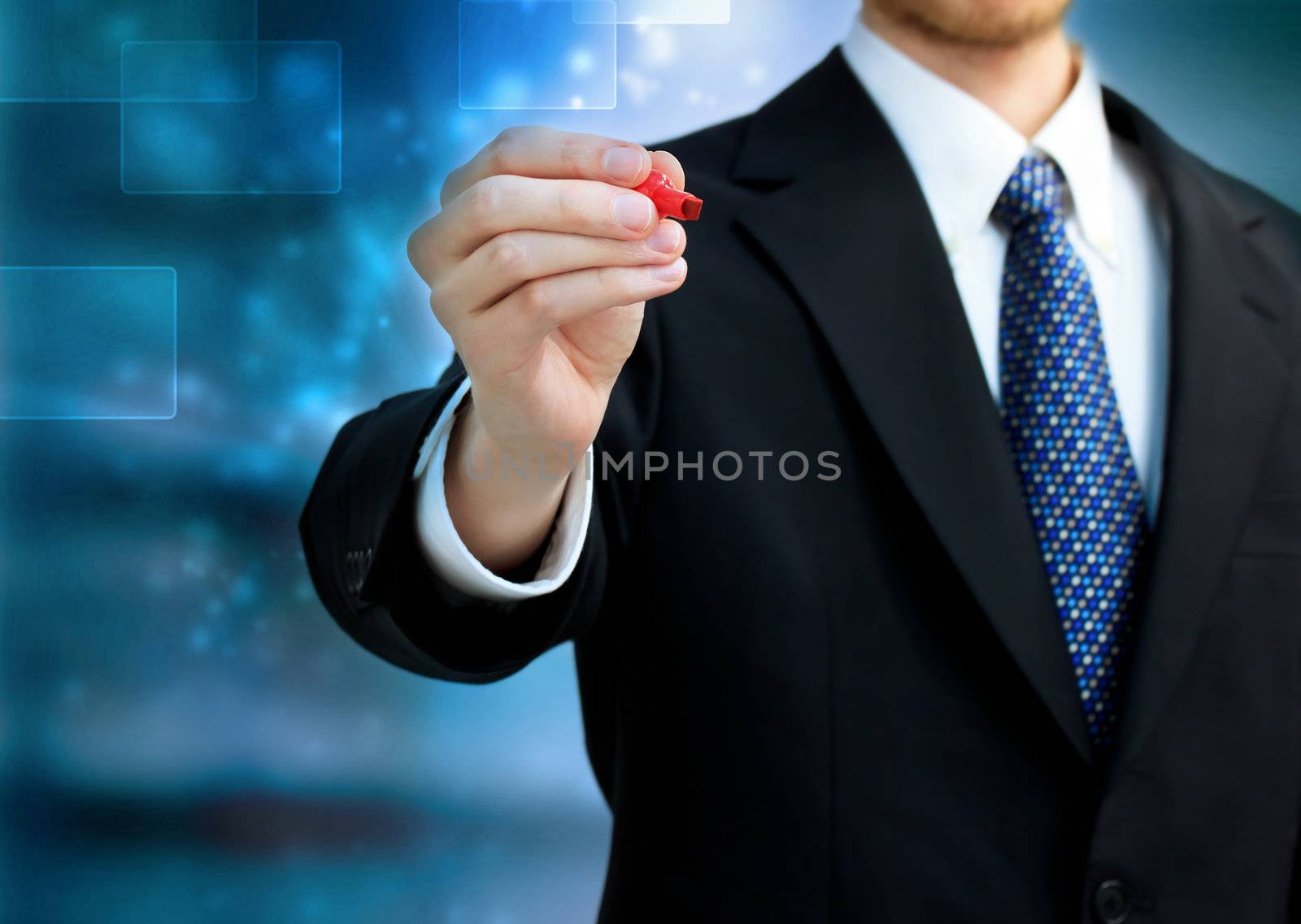 Business man holding a red pen by melpomene