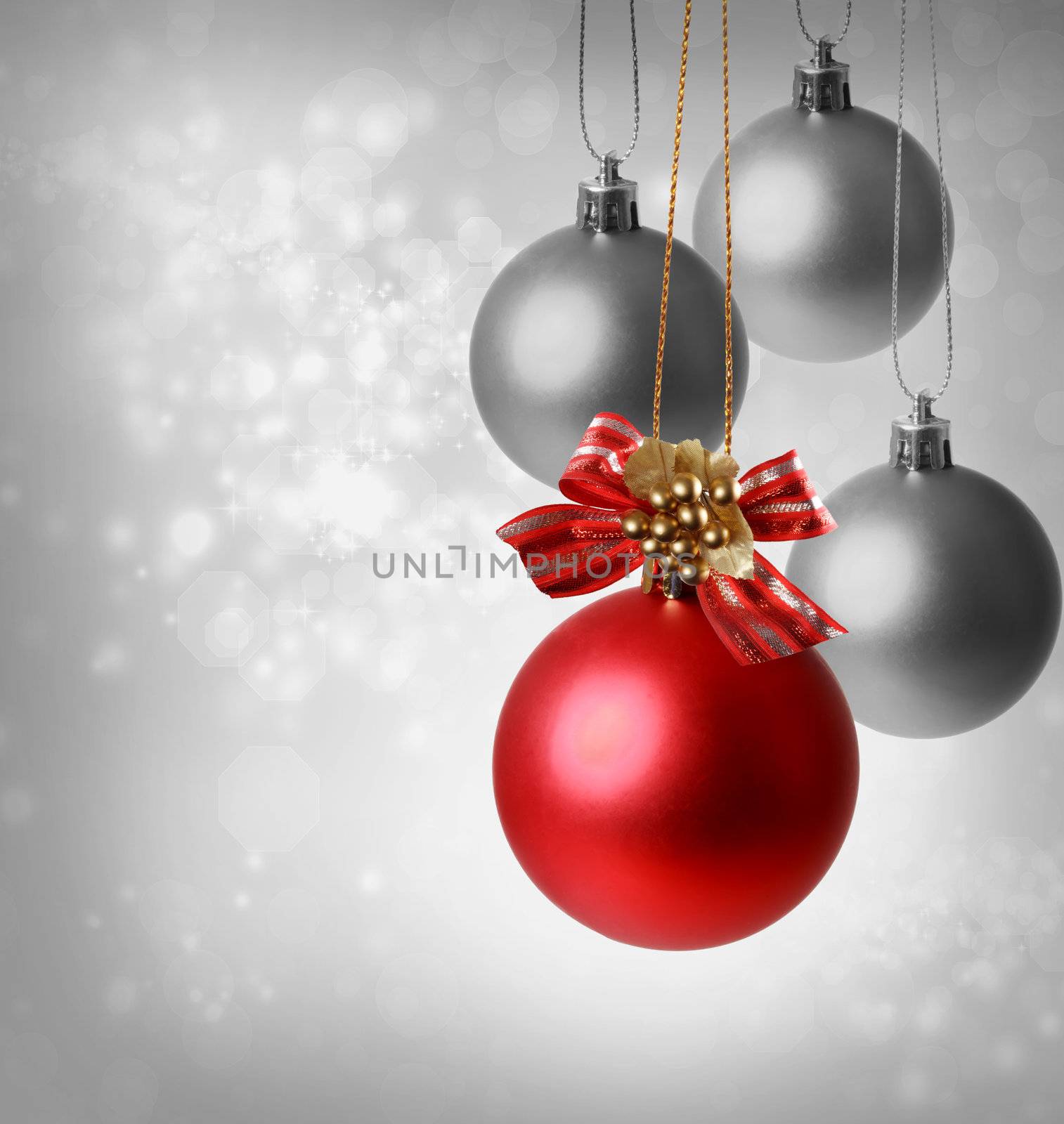 Christmas red ornaments over silver lights background