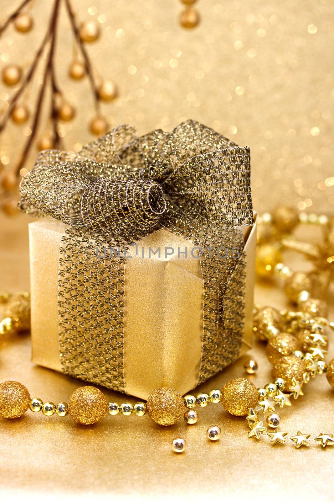 Golden colored image of Christmas gift