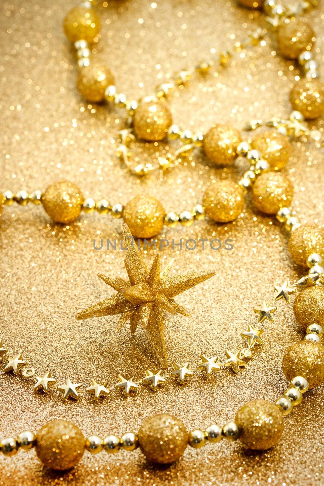Christmas star with glittering golden ornaments
