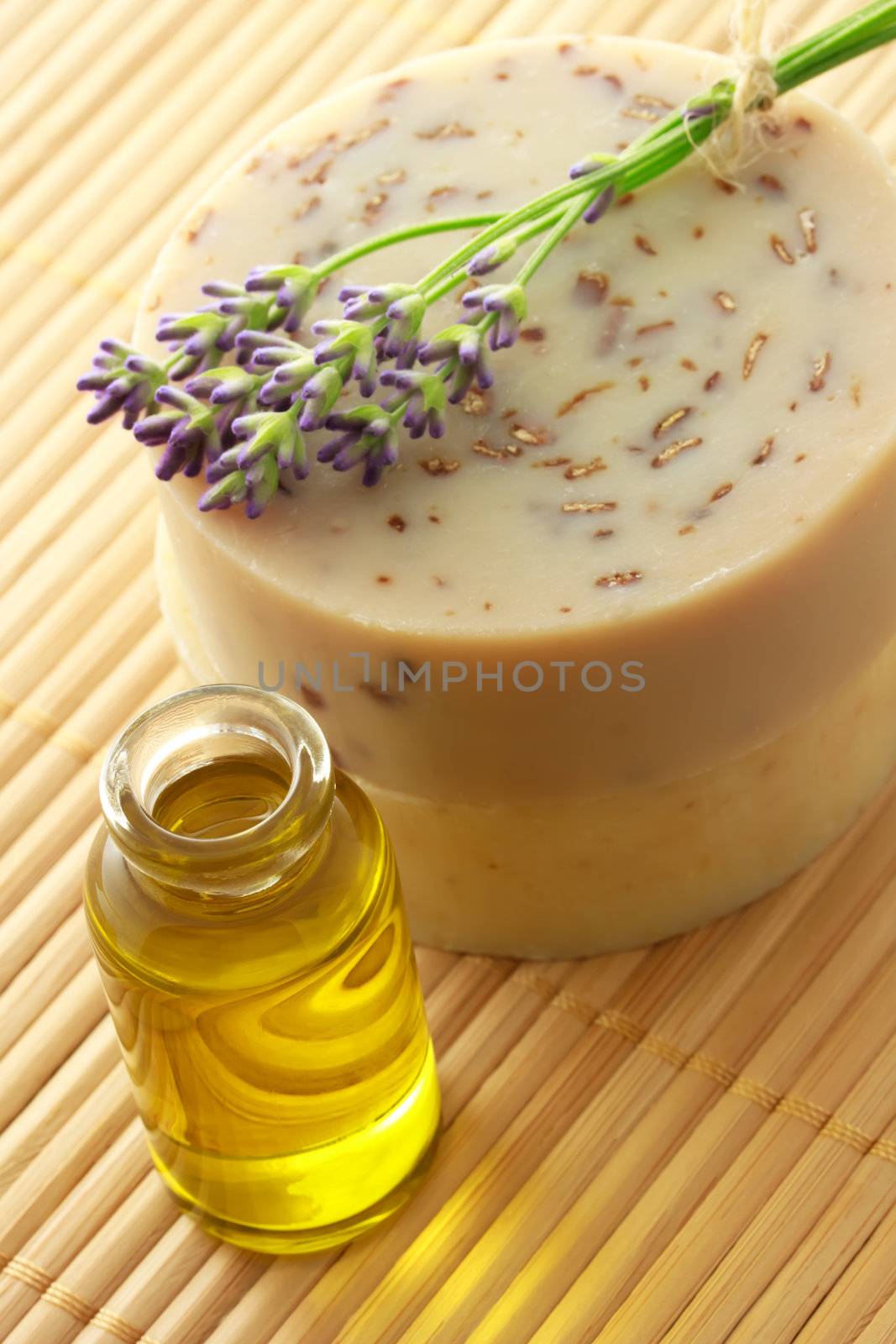 Essential oil and bars of handmade soap