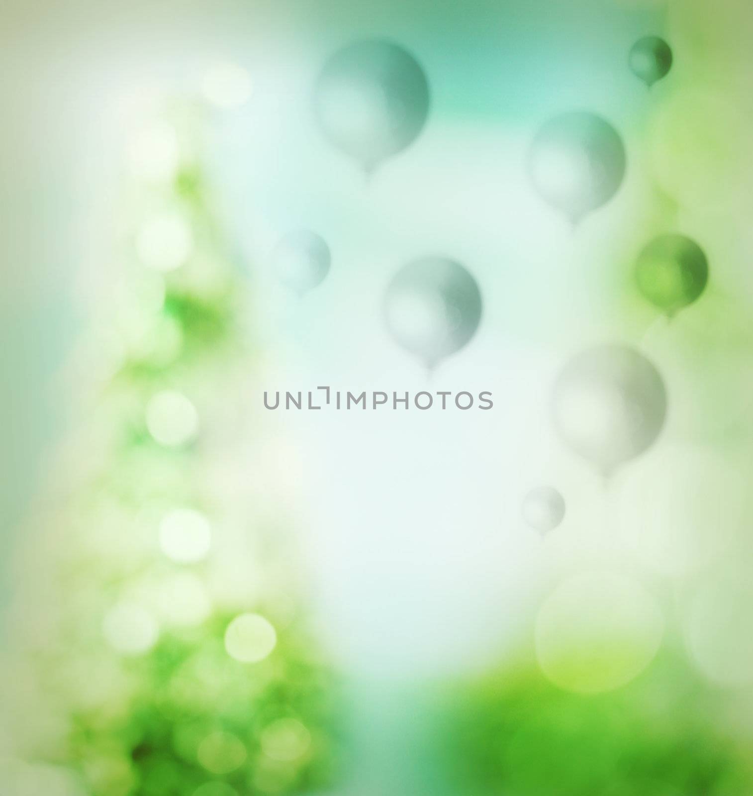 Green balloons over soft lights background