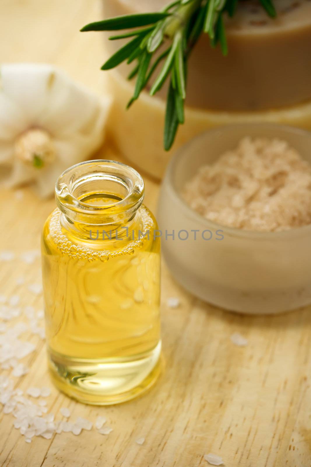 Essential oil with bars of soap and bath salt