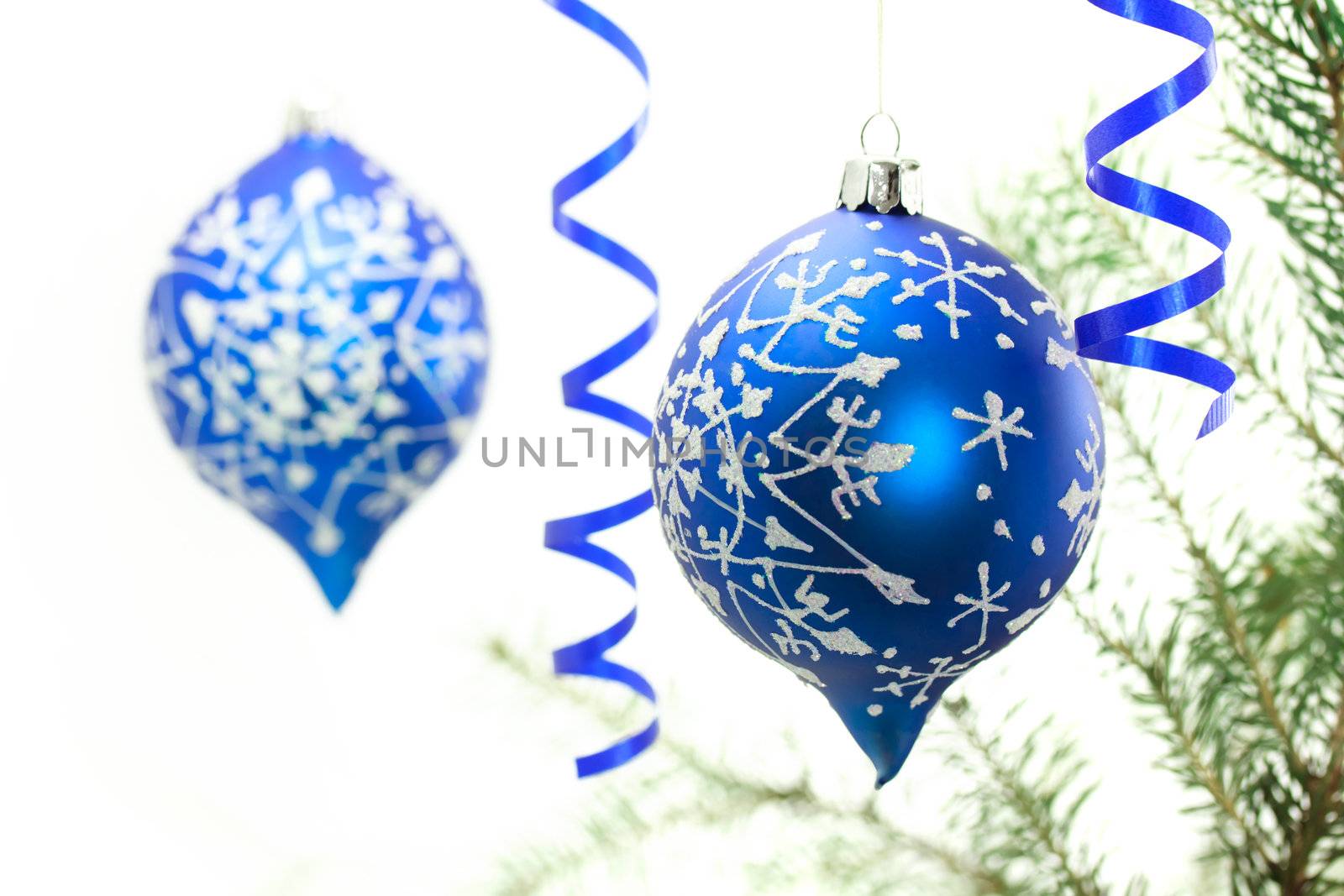 Blue Christmas ornaments on white background