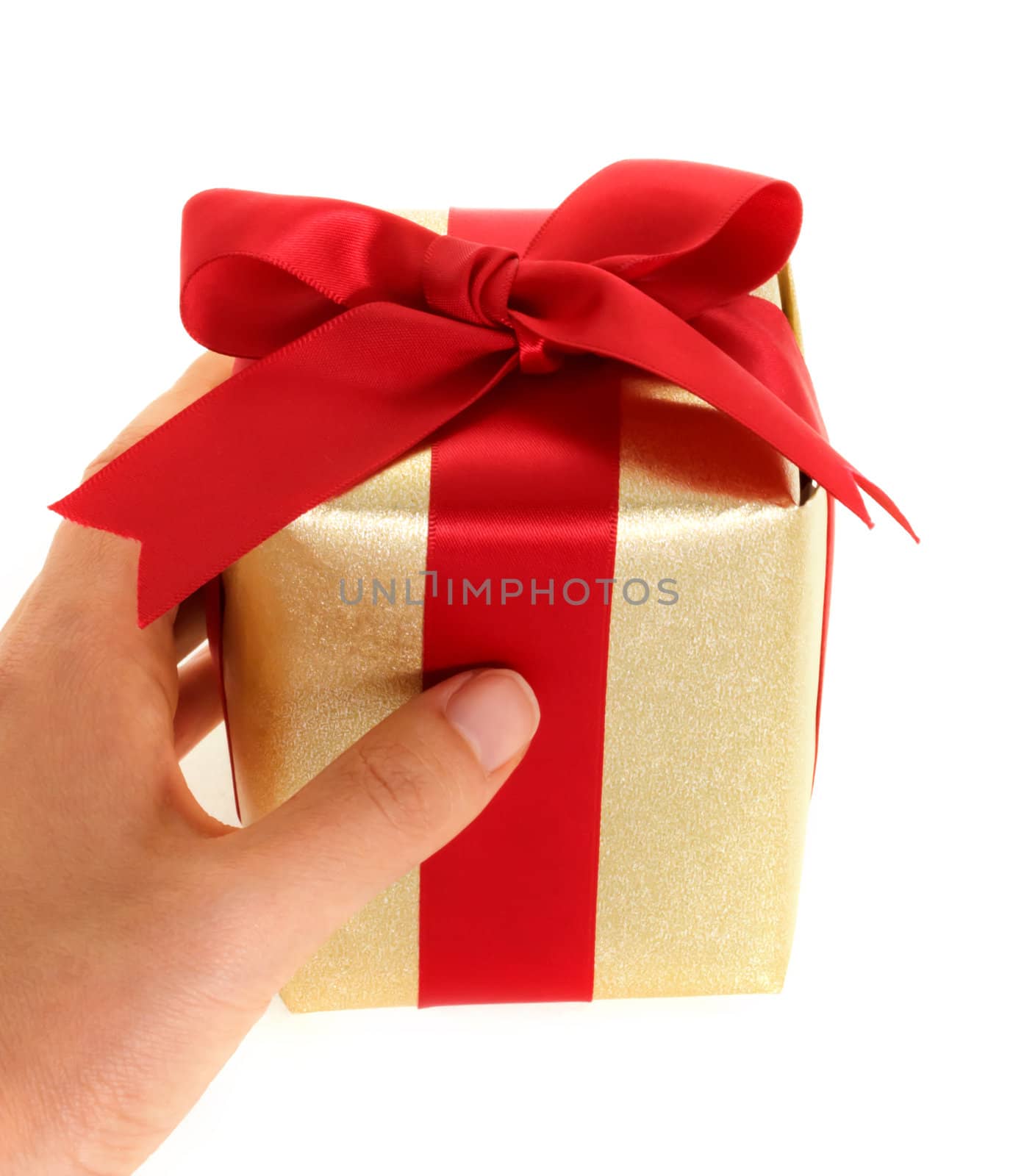 Hand holding gift box on white background