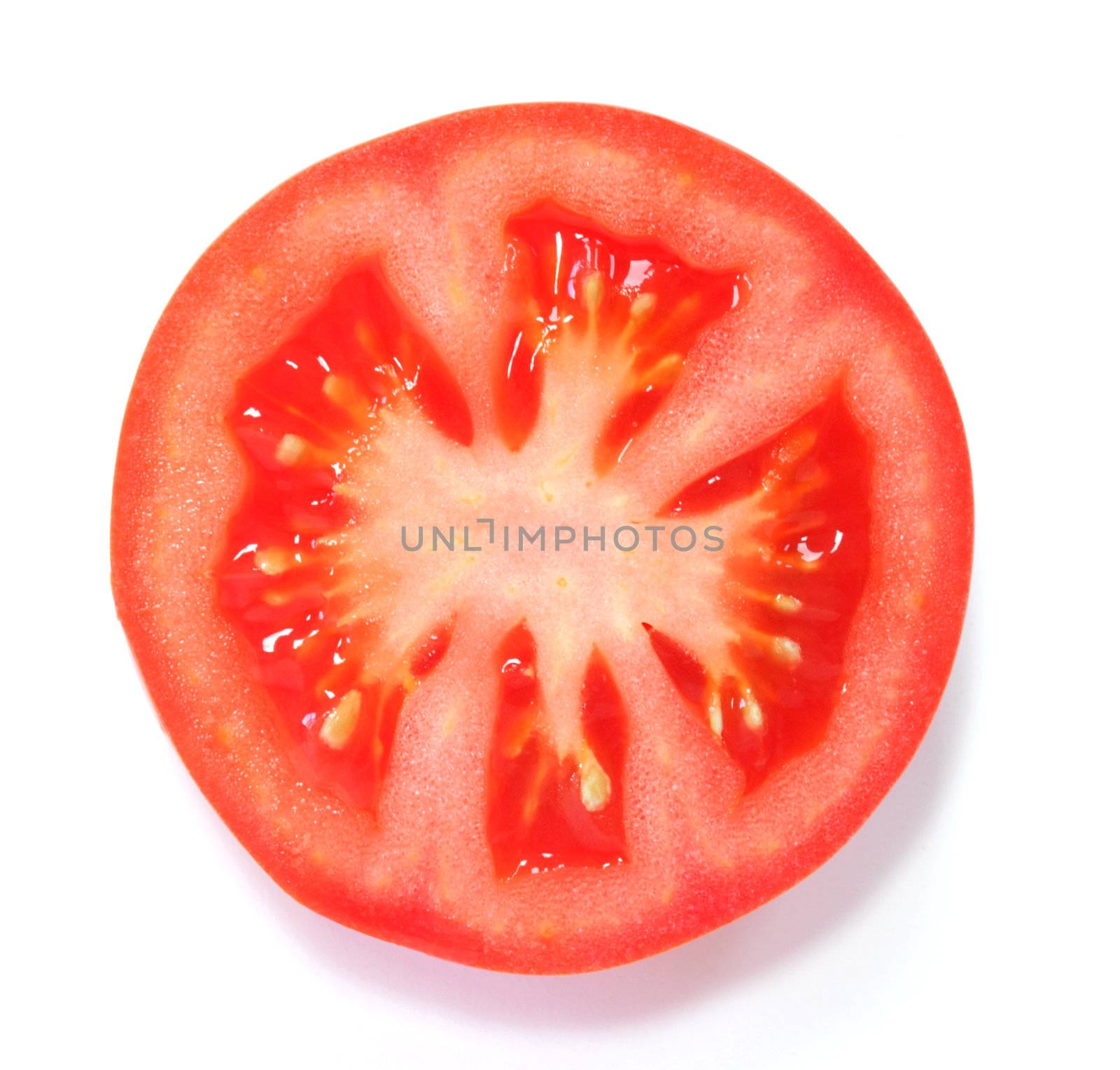 Sliced tomato on white background