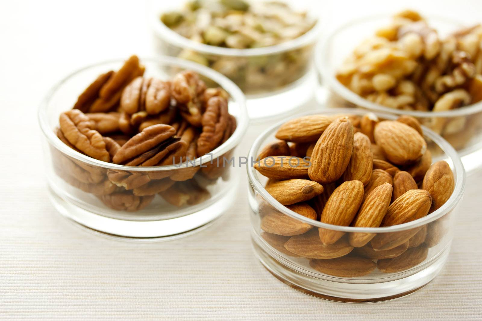 Assortment of nuts in glass containers