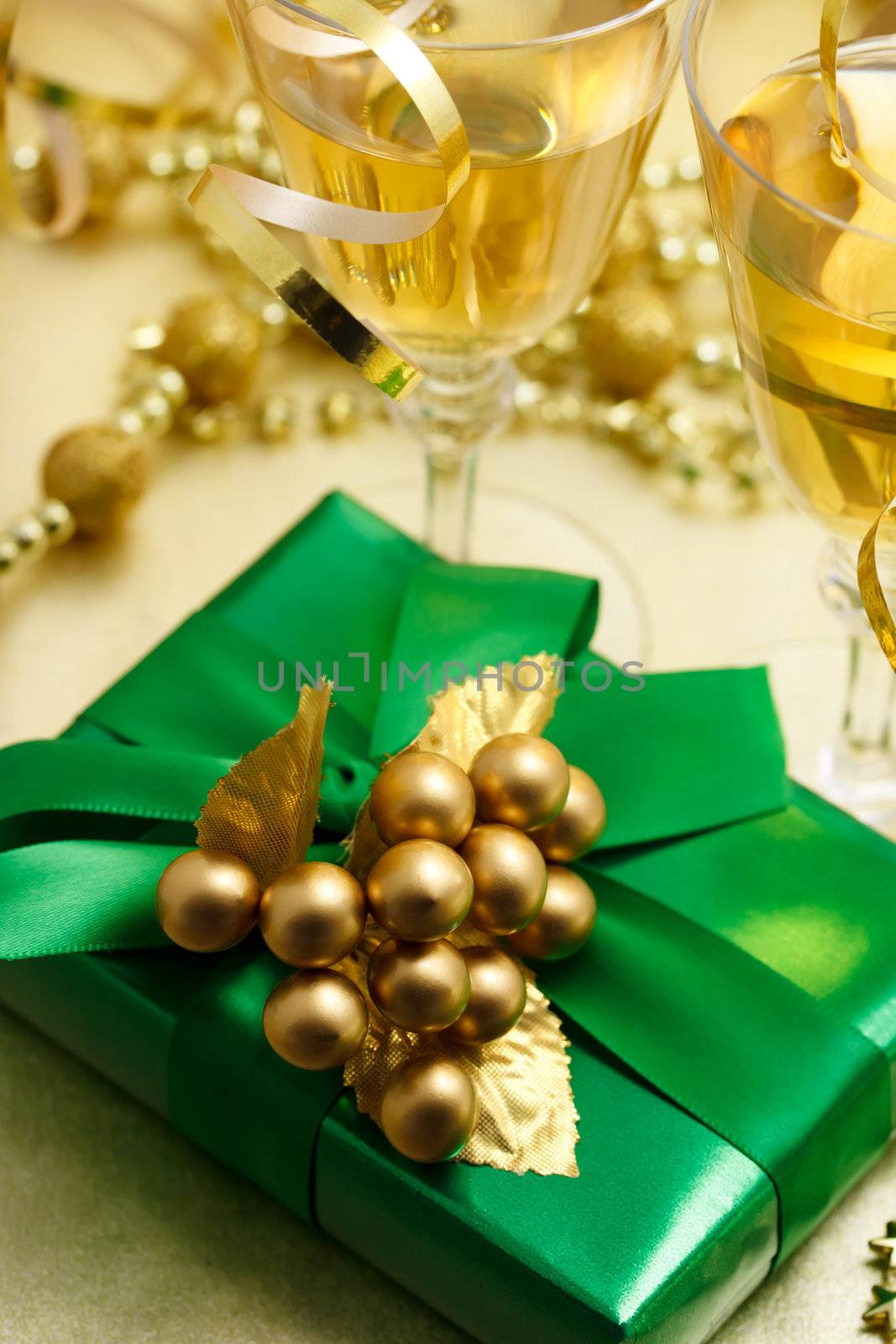 Christmas gift with champagne - Gold and green colored image