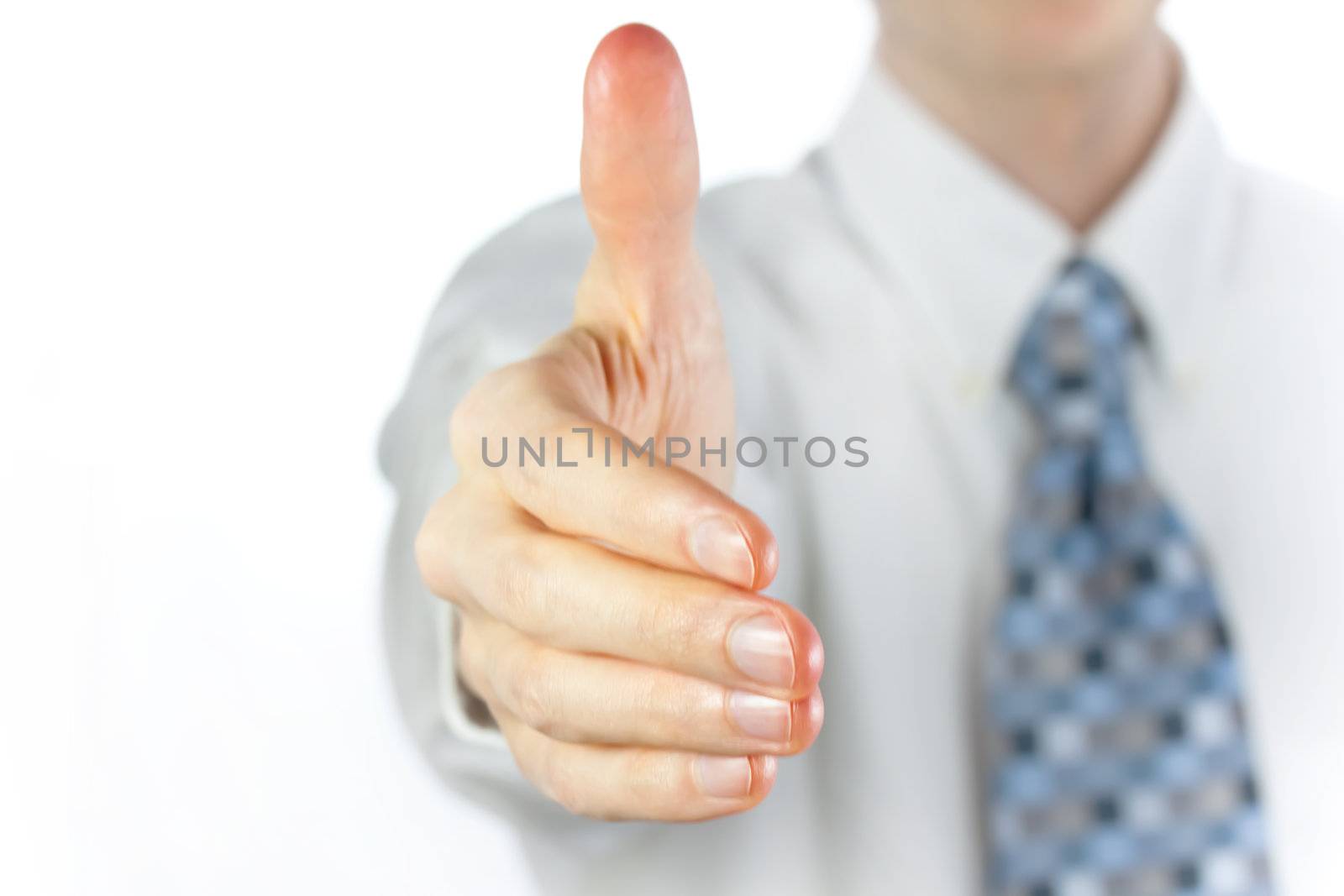 Business man extending hand to shake over white background