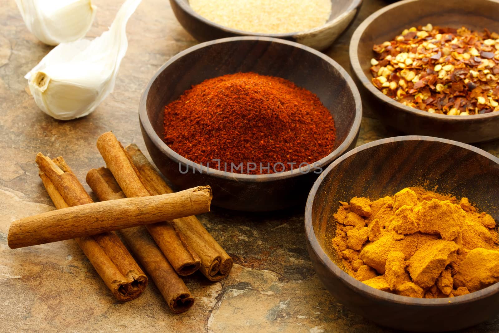 Assortment of spices in wooden bowls