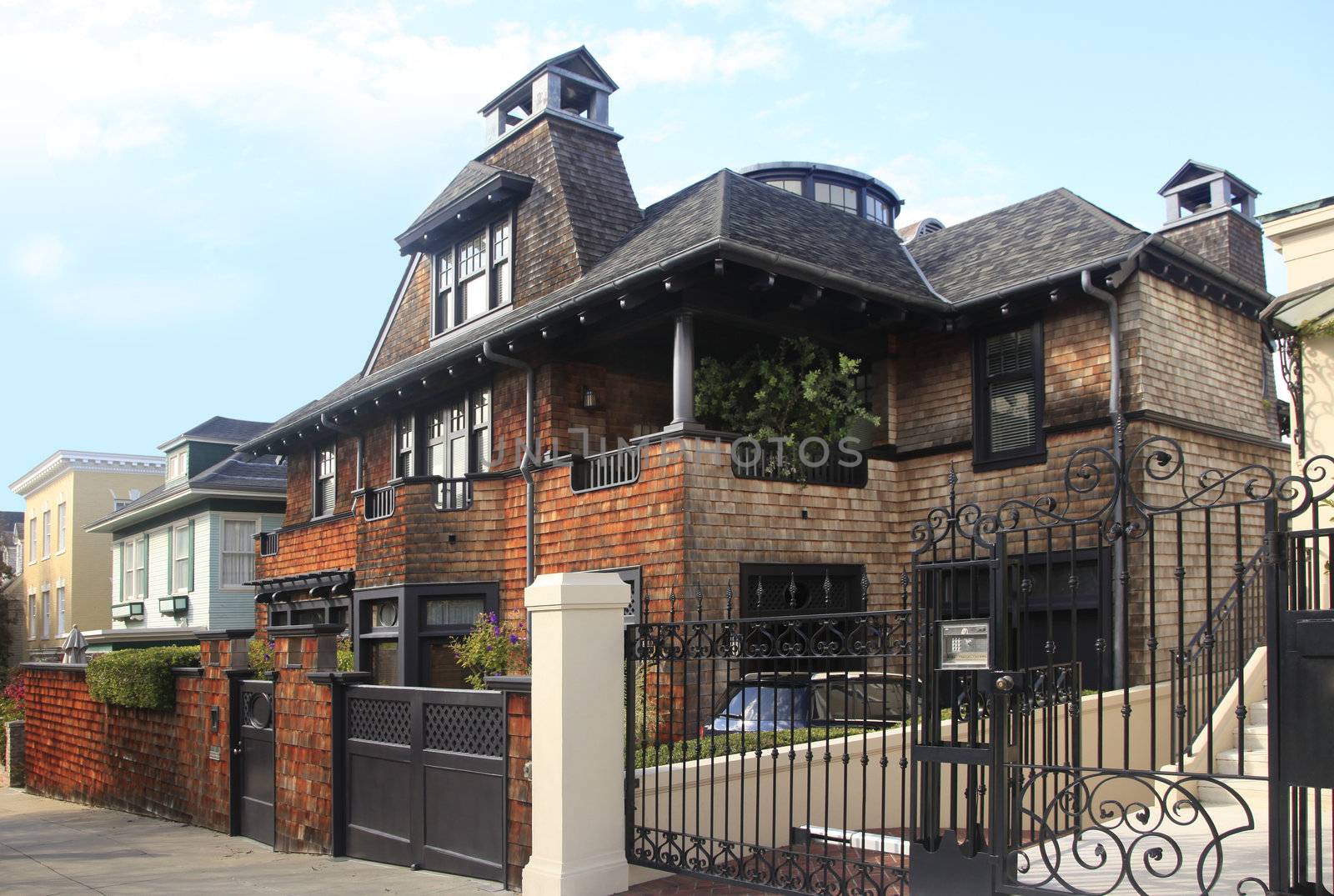 Brick residential home with the garage in the front. San Francisco, California