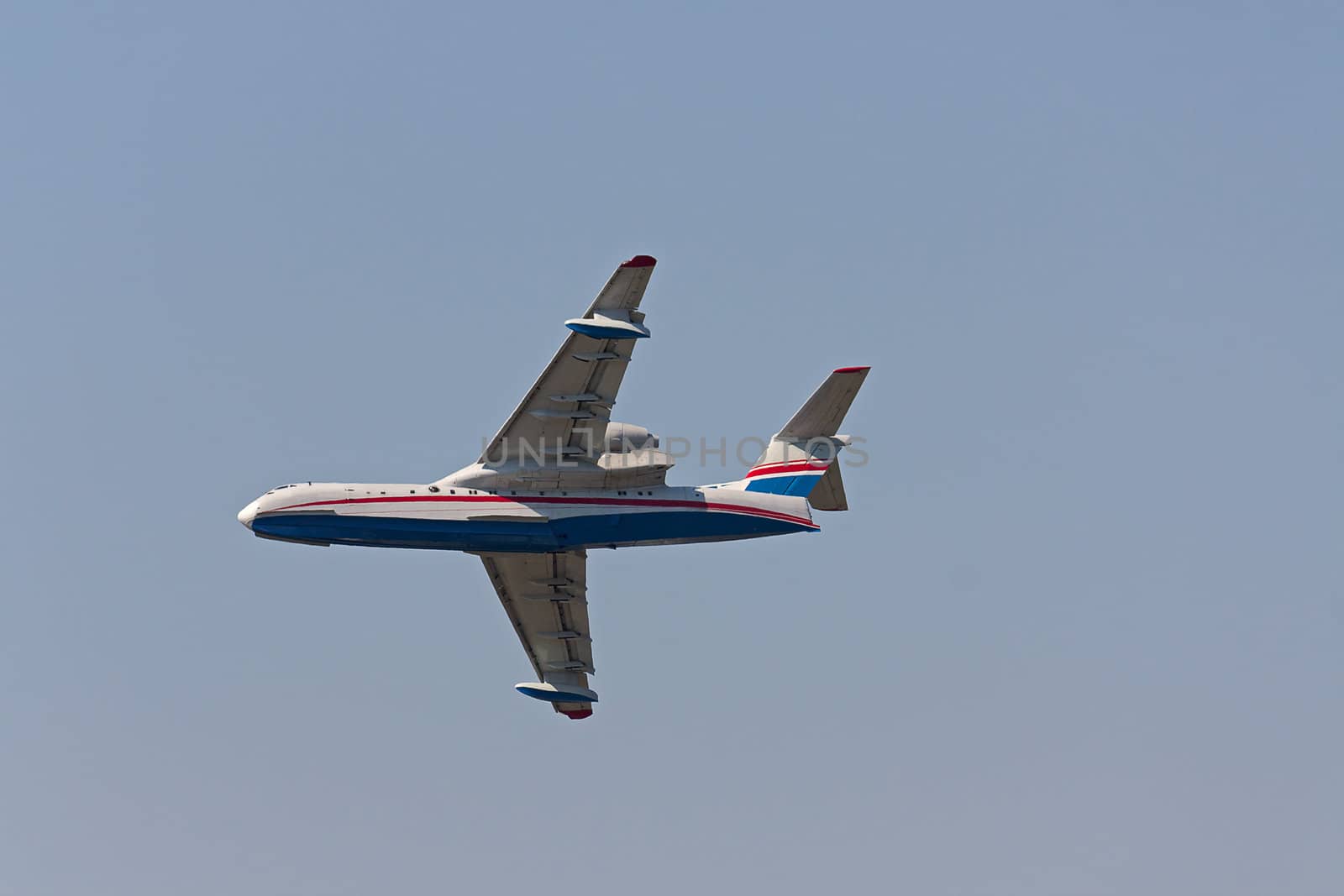 Airplane close-up on  background of blue sky, Russia.