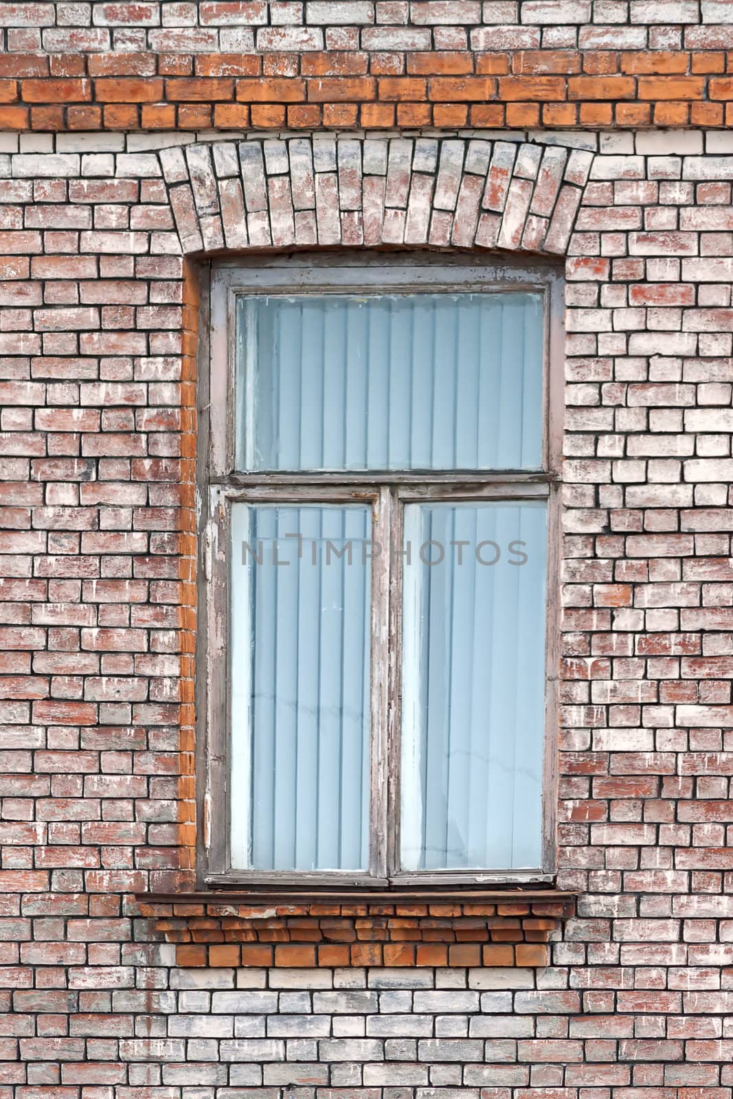 Window  on  background of  old wall of  house.