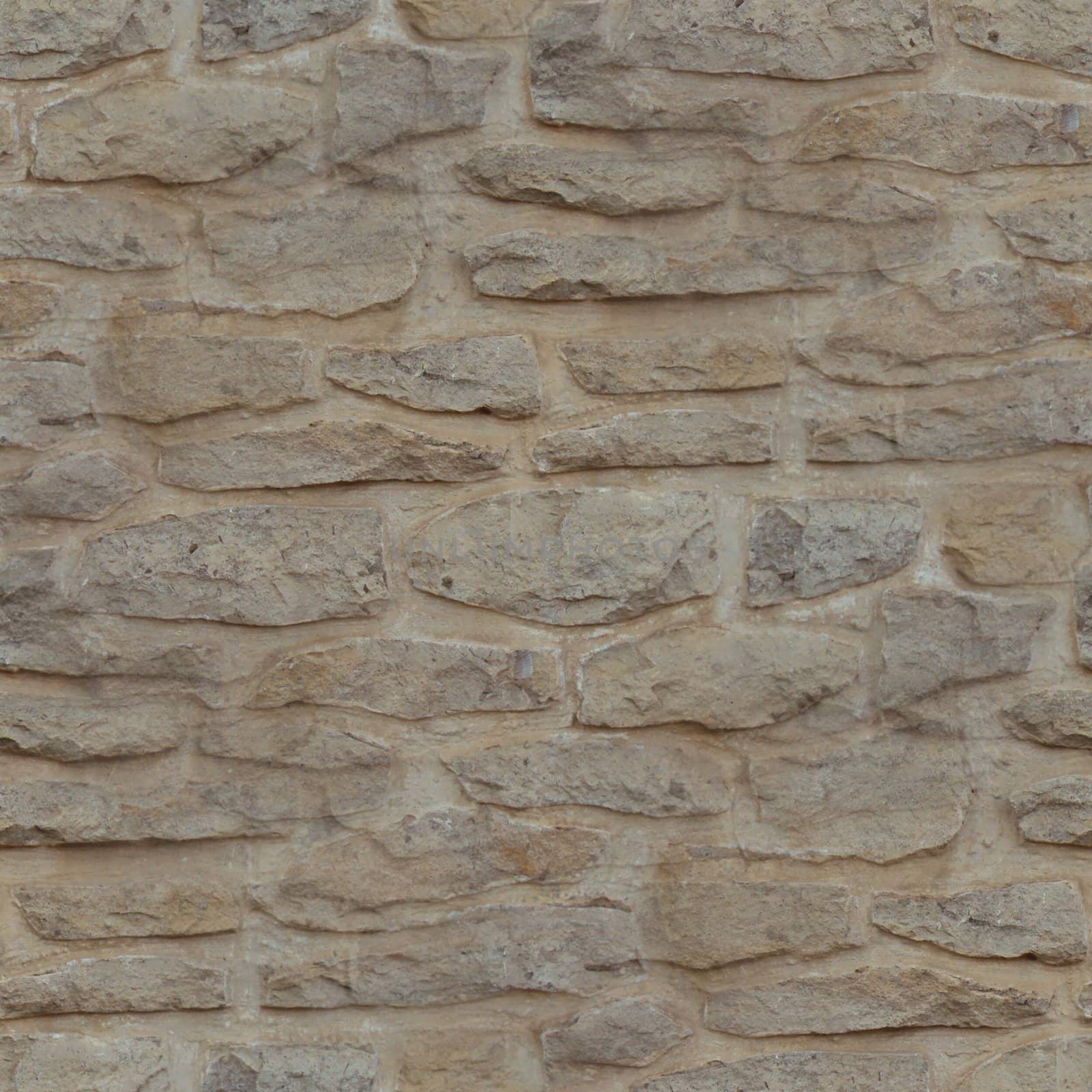 Seamless textured background of a rubble stone wall