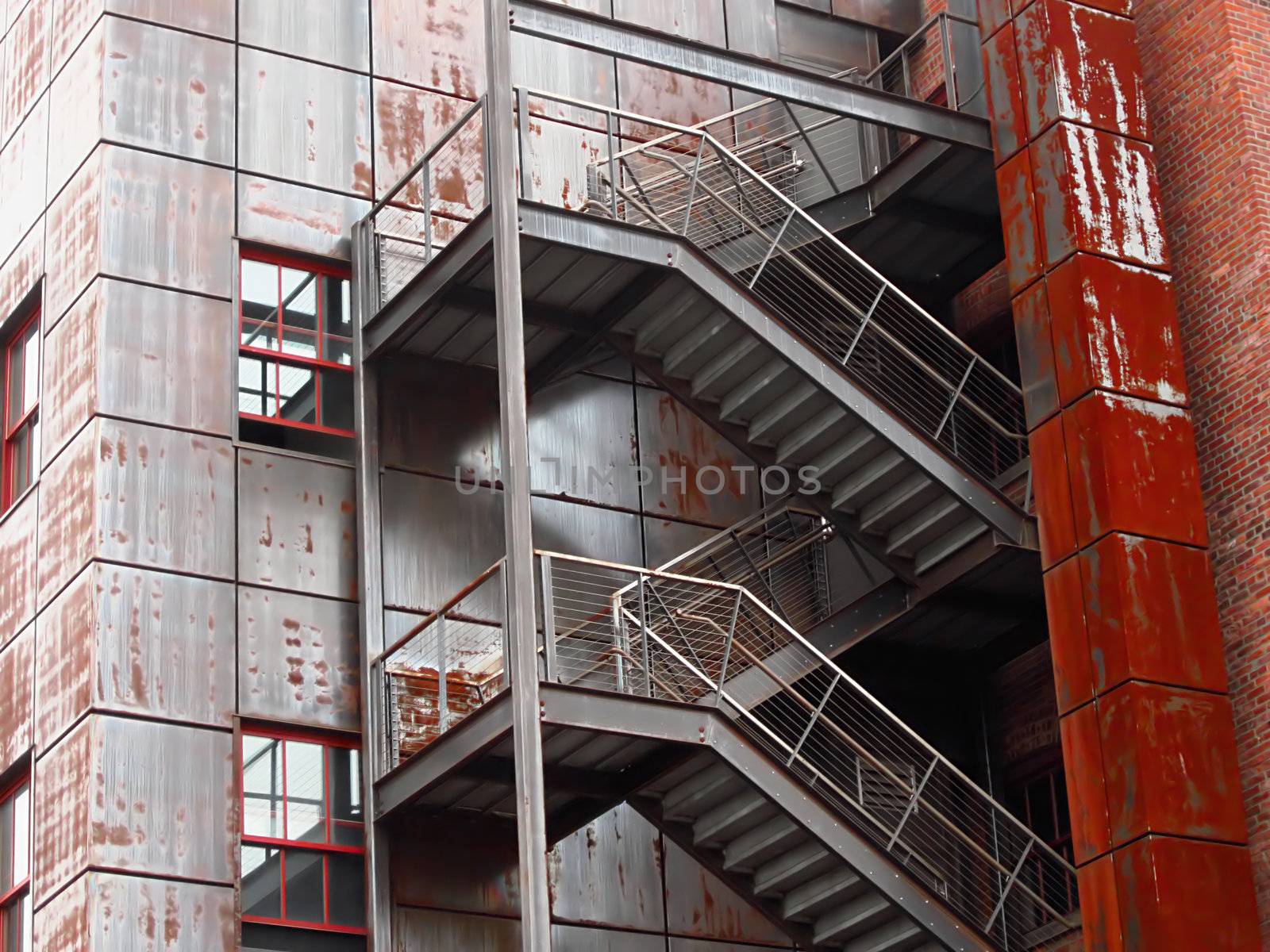 A photograph of an outside staircase detailing its unique architectural design.