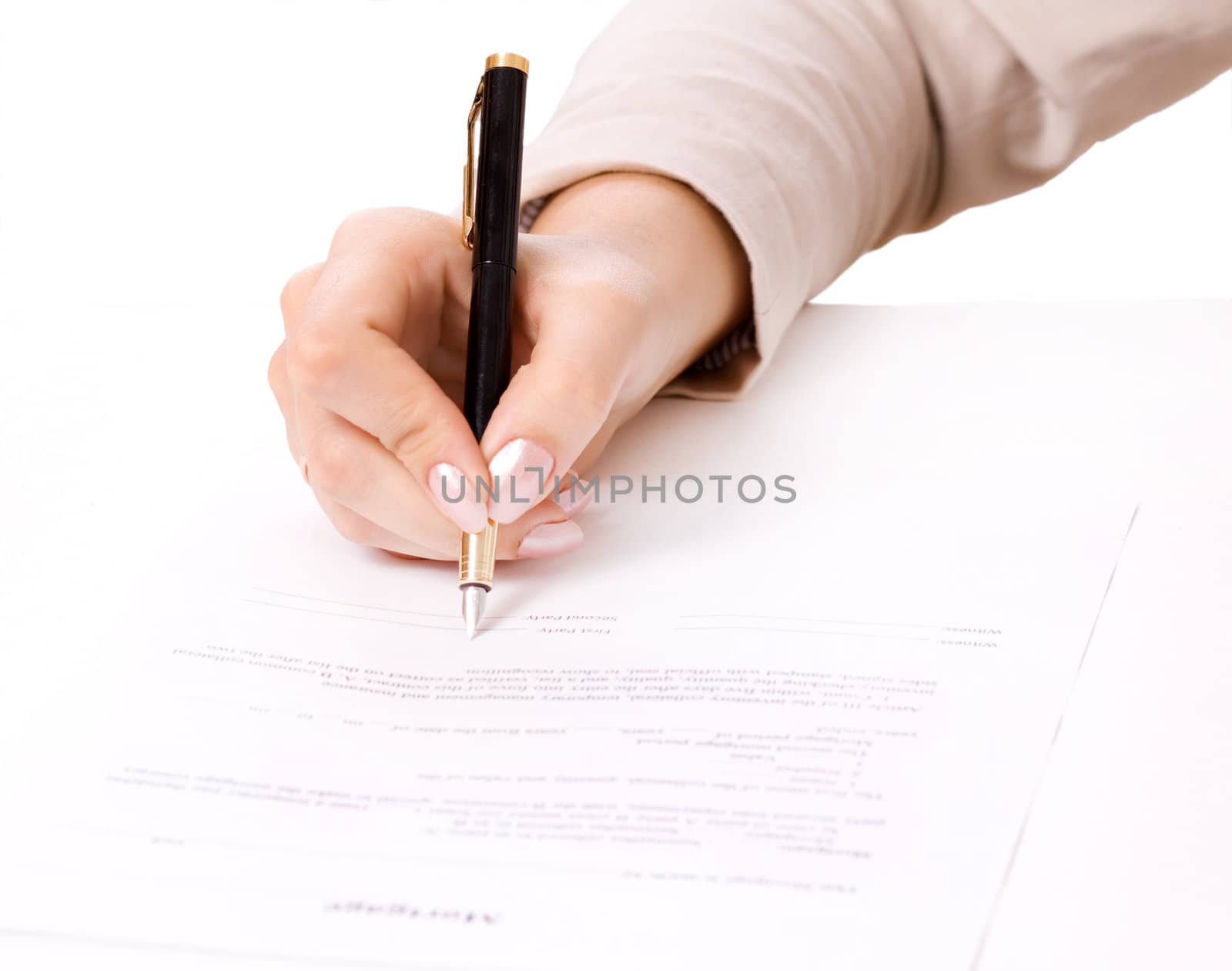 Close up of female hand signing a contract, mortgage