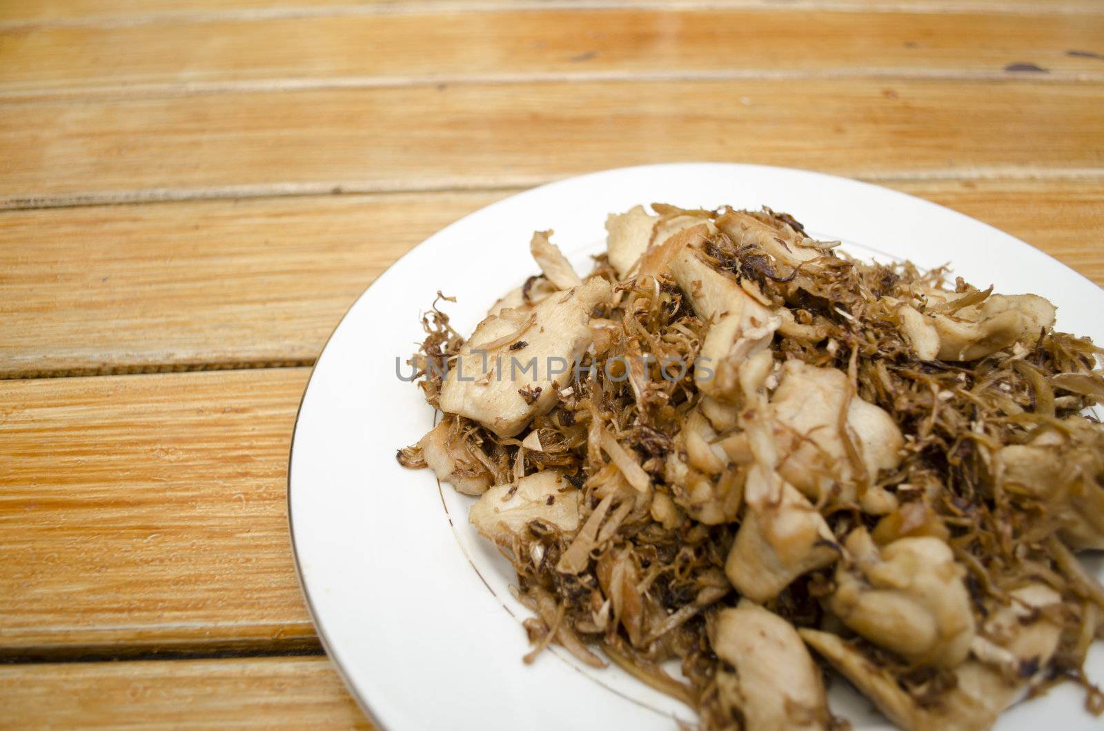 Asian style fried pork on dish, delicious thail food