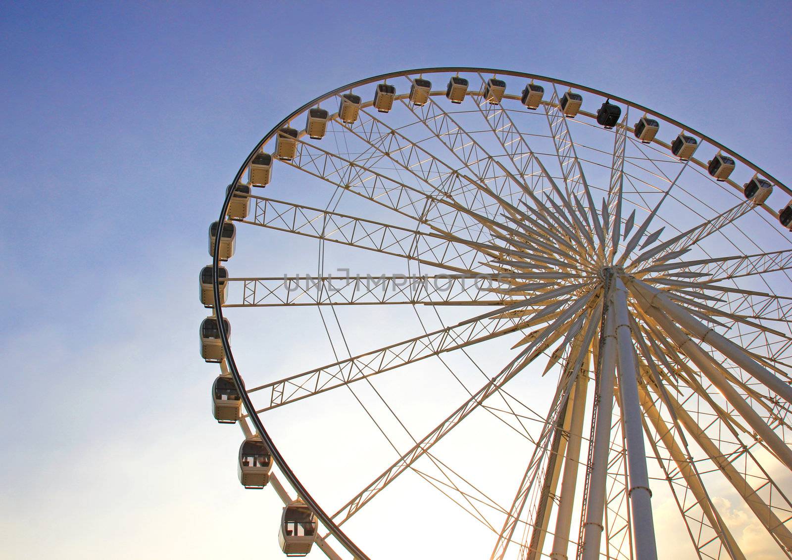 Ferris wheel with blue sky by nuchylee