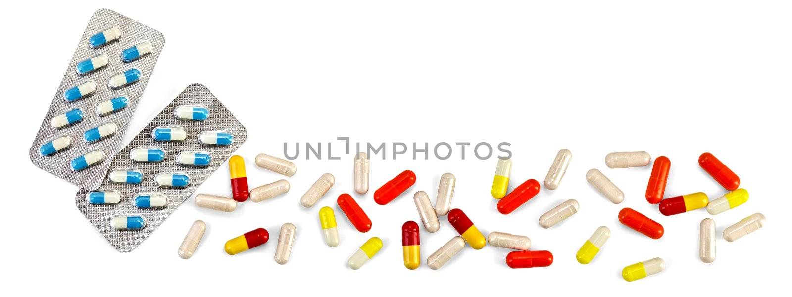 Blue capsules in two packs, capsules red, yellow and beige isolated on white background