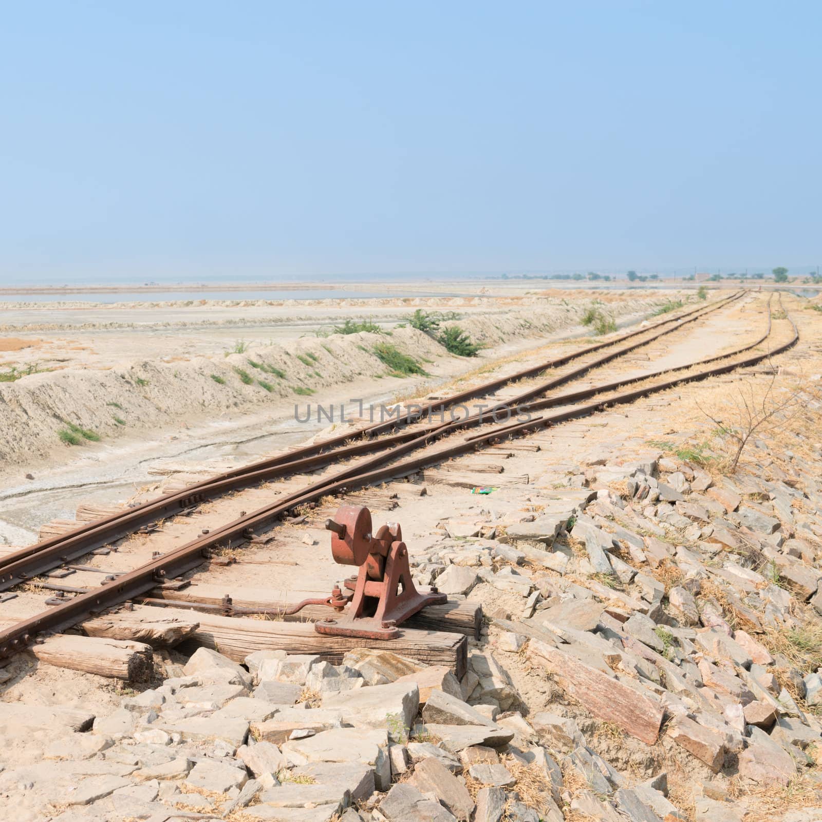 Old railway line on Sambhar Salt Lake. It is the India's largest saline lake, where salt has been farmed for a thousand years. 