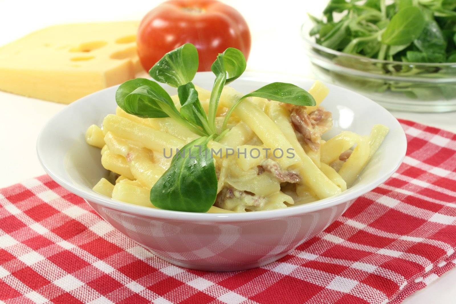 Pasta Carbonara with ham and corn salad