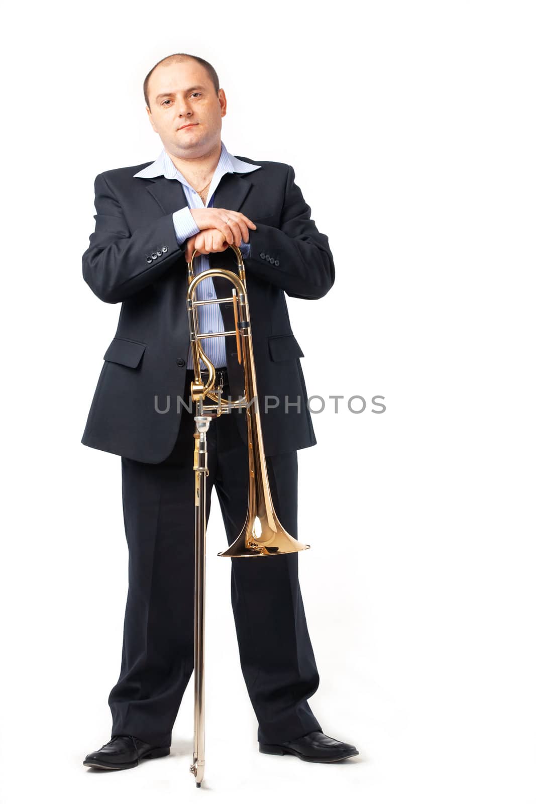 Young man with his trombone.