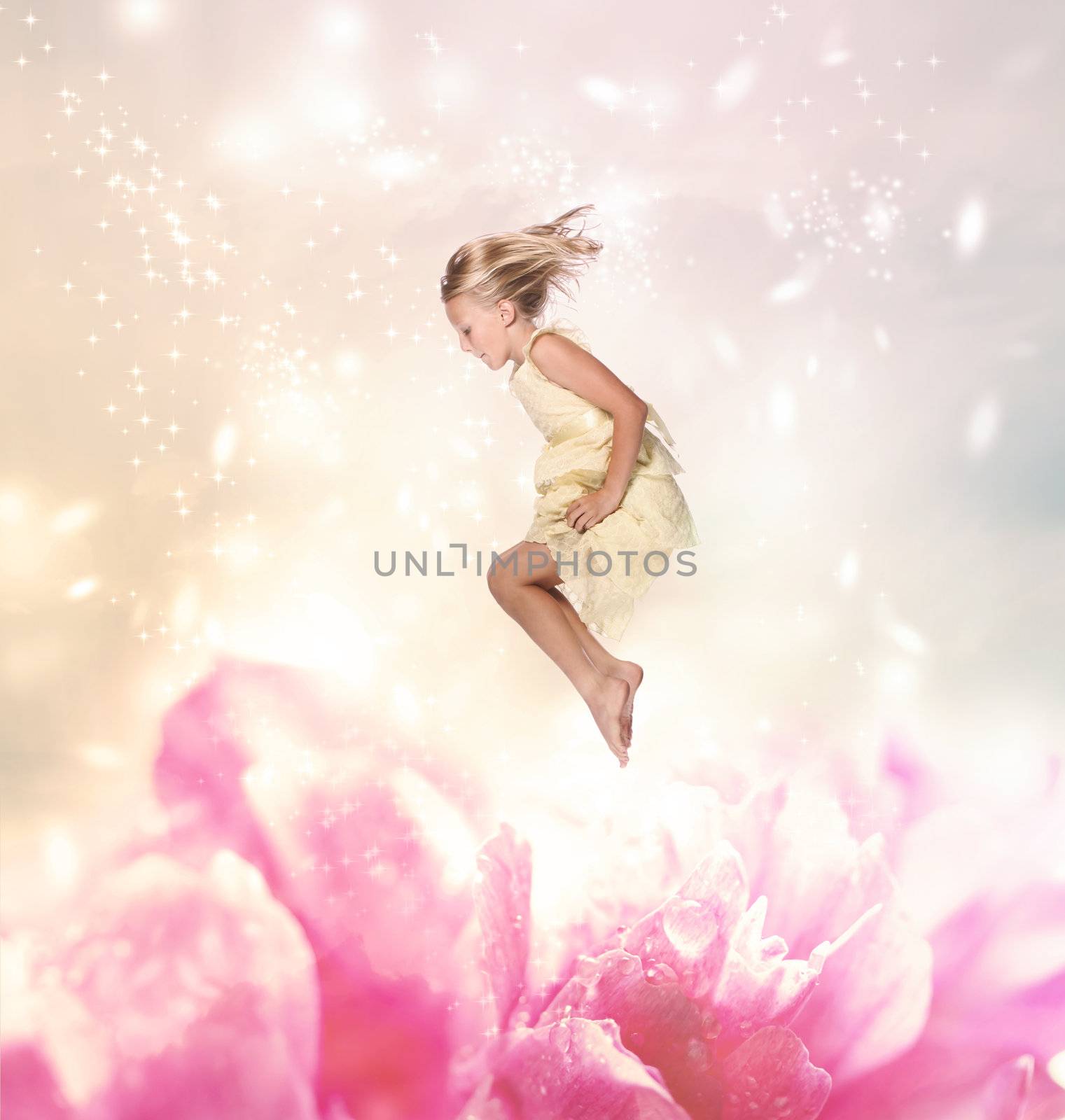 Blond Girl Jumping into a Giant Flower