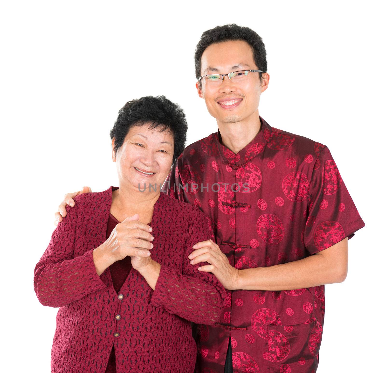 Happy Chinese New Year. Happy Asian Chinese family with gesture of congratulation over white background