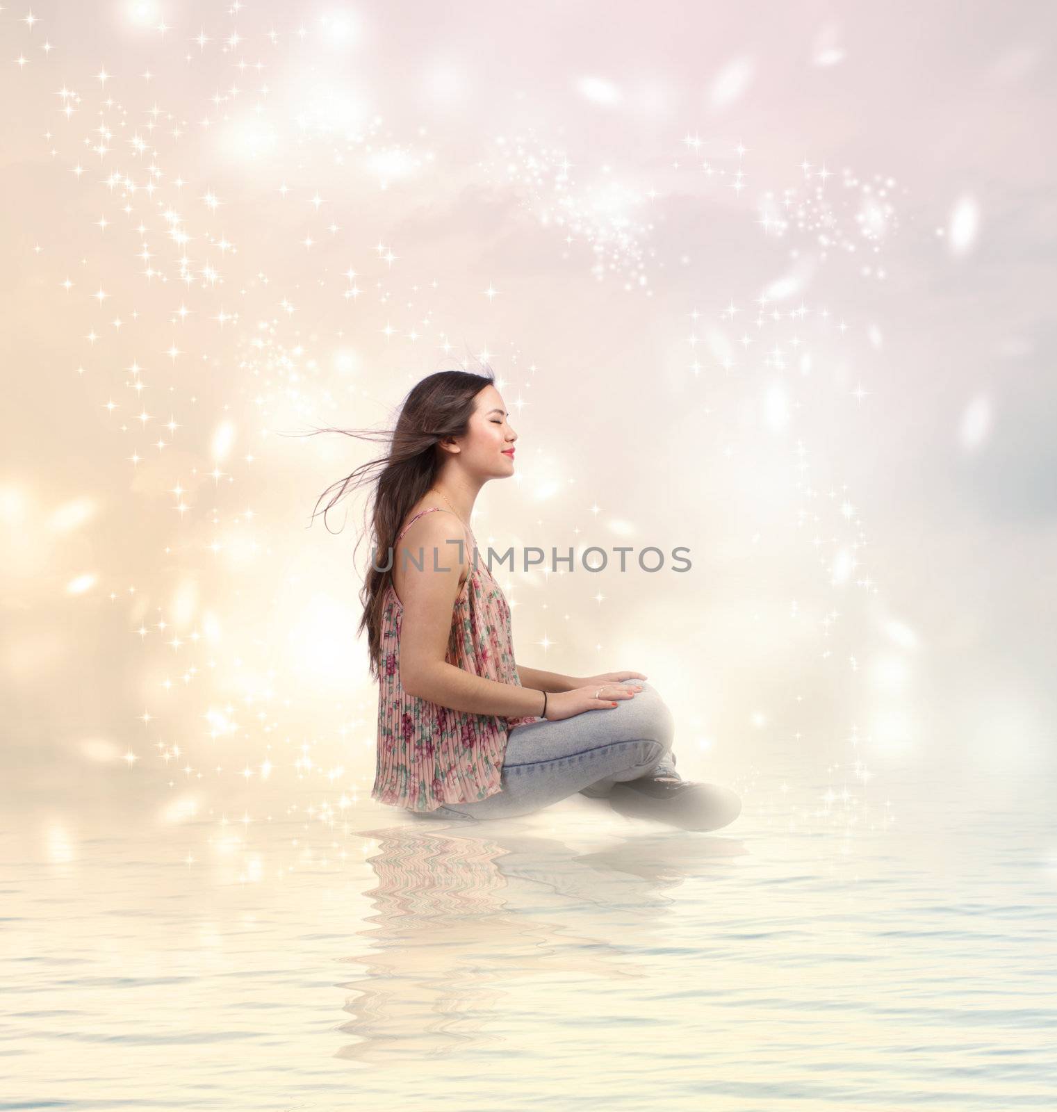 Happy Young Woman Sitting by the Water by melpomene