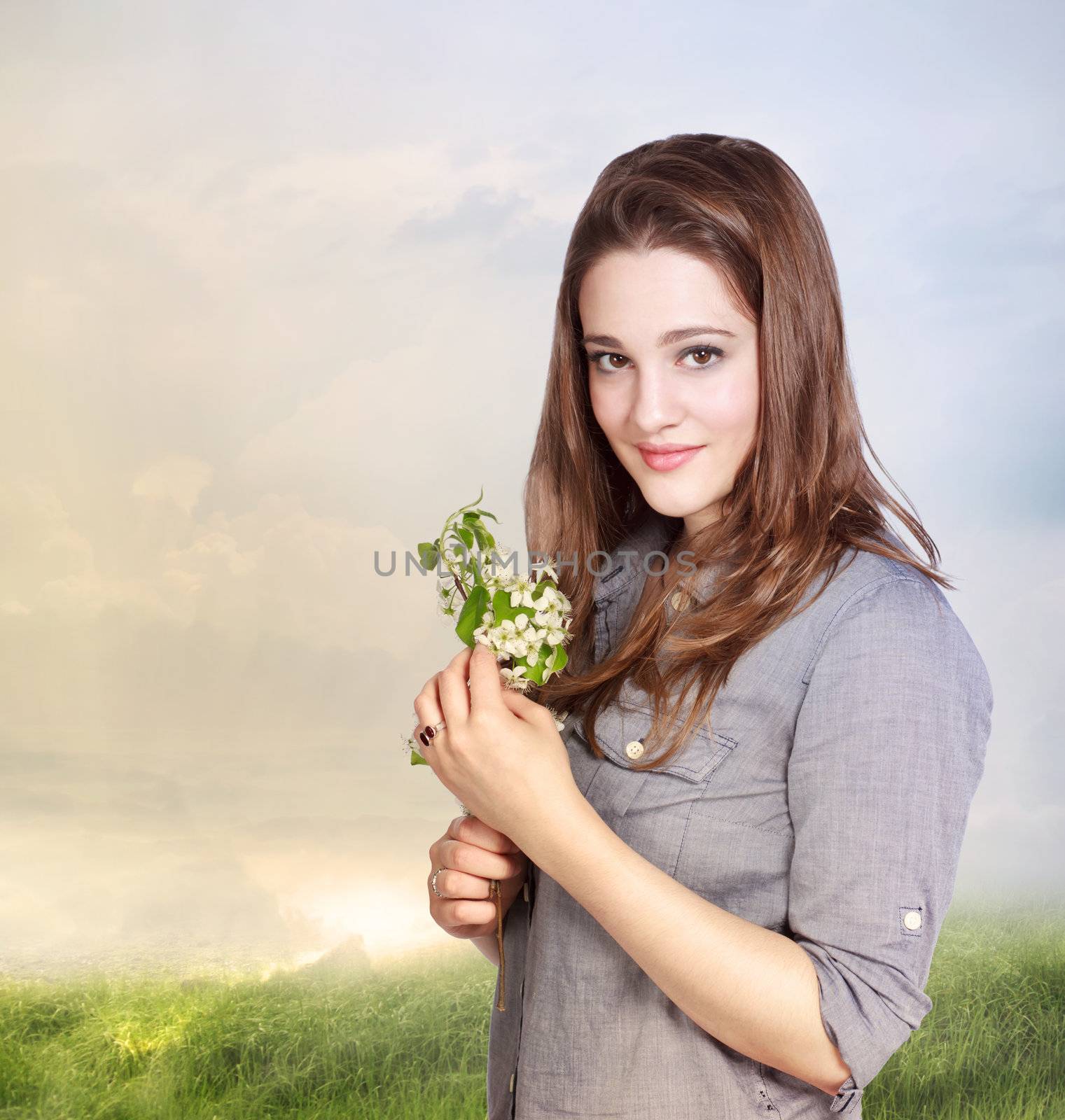 Beautiful Young Woman Holding  White Flowers