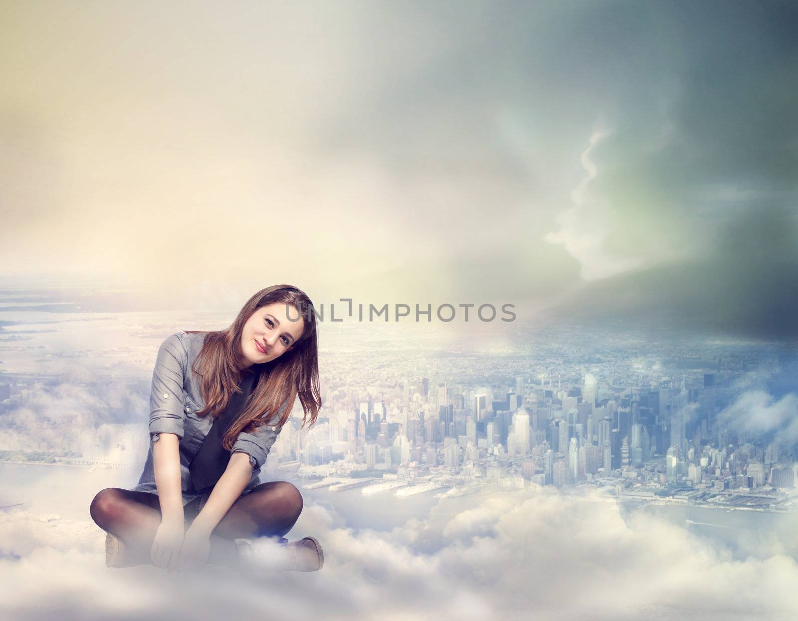 Happy Young Woman Sitting on the Clouds