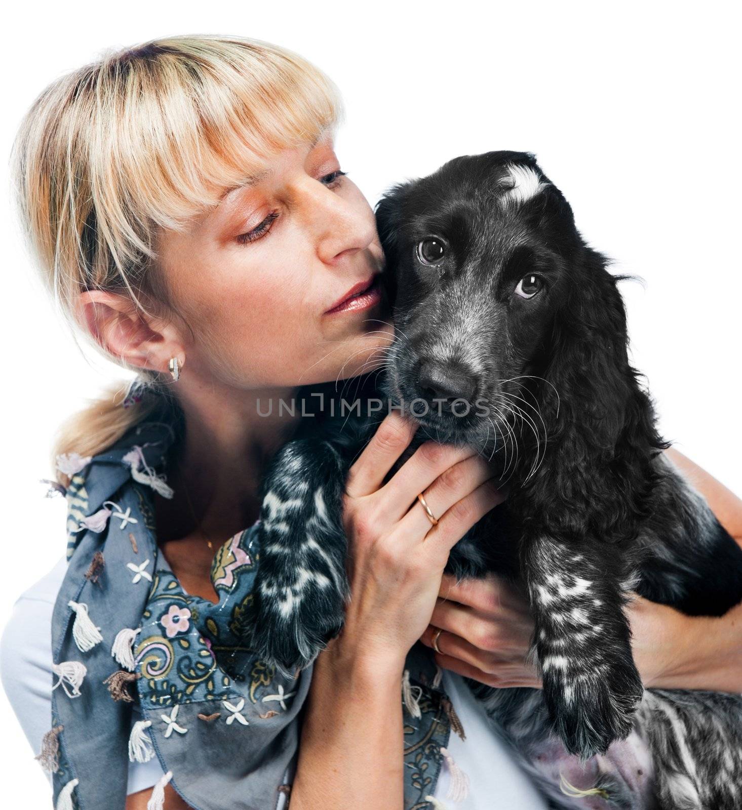 Young cocker spaniel and young woman on white background