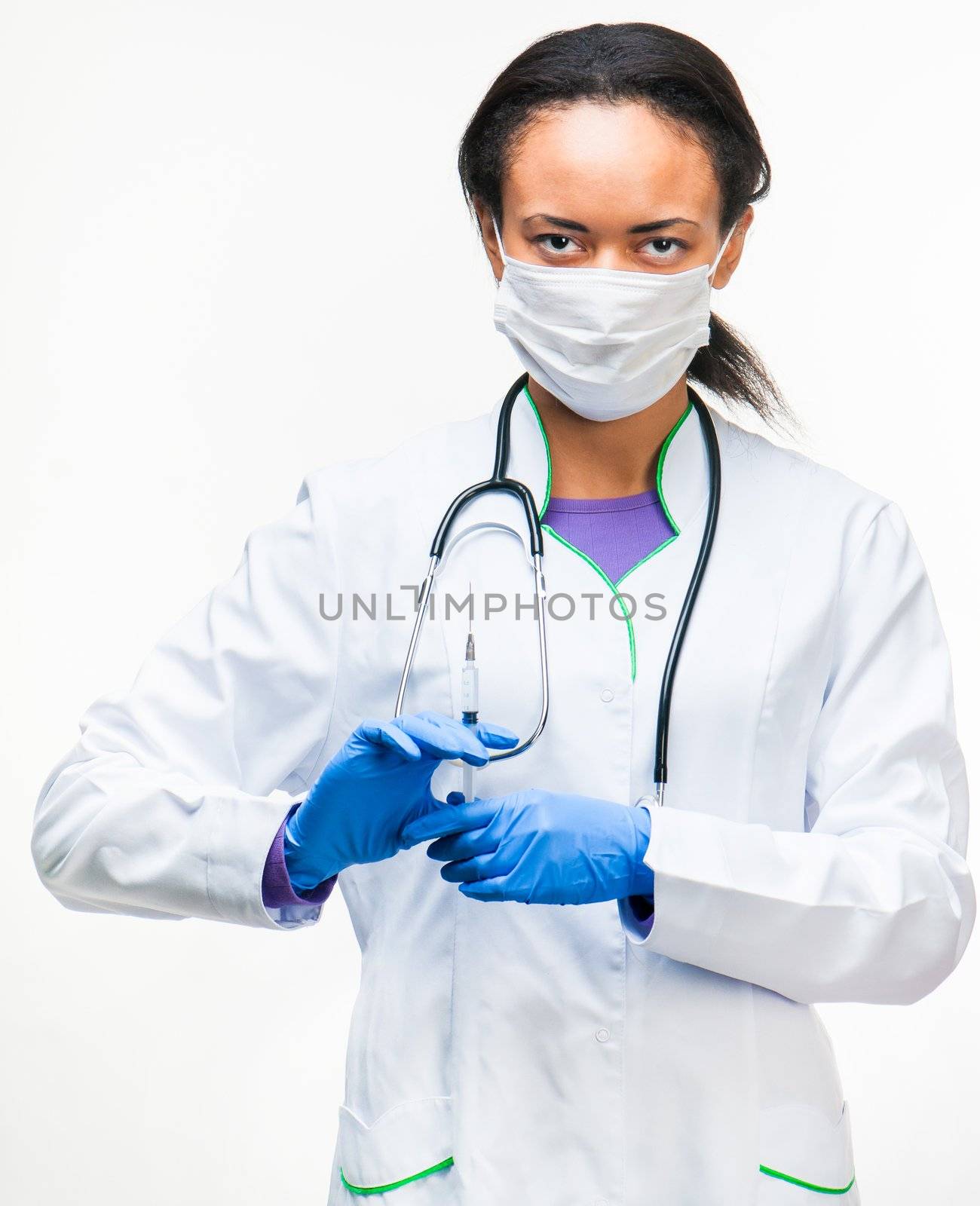 doctor holding a syringe in hands over white