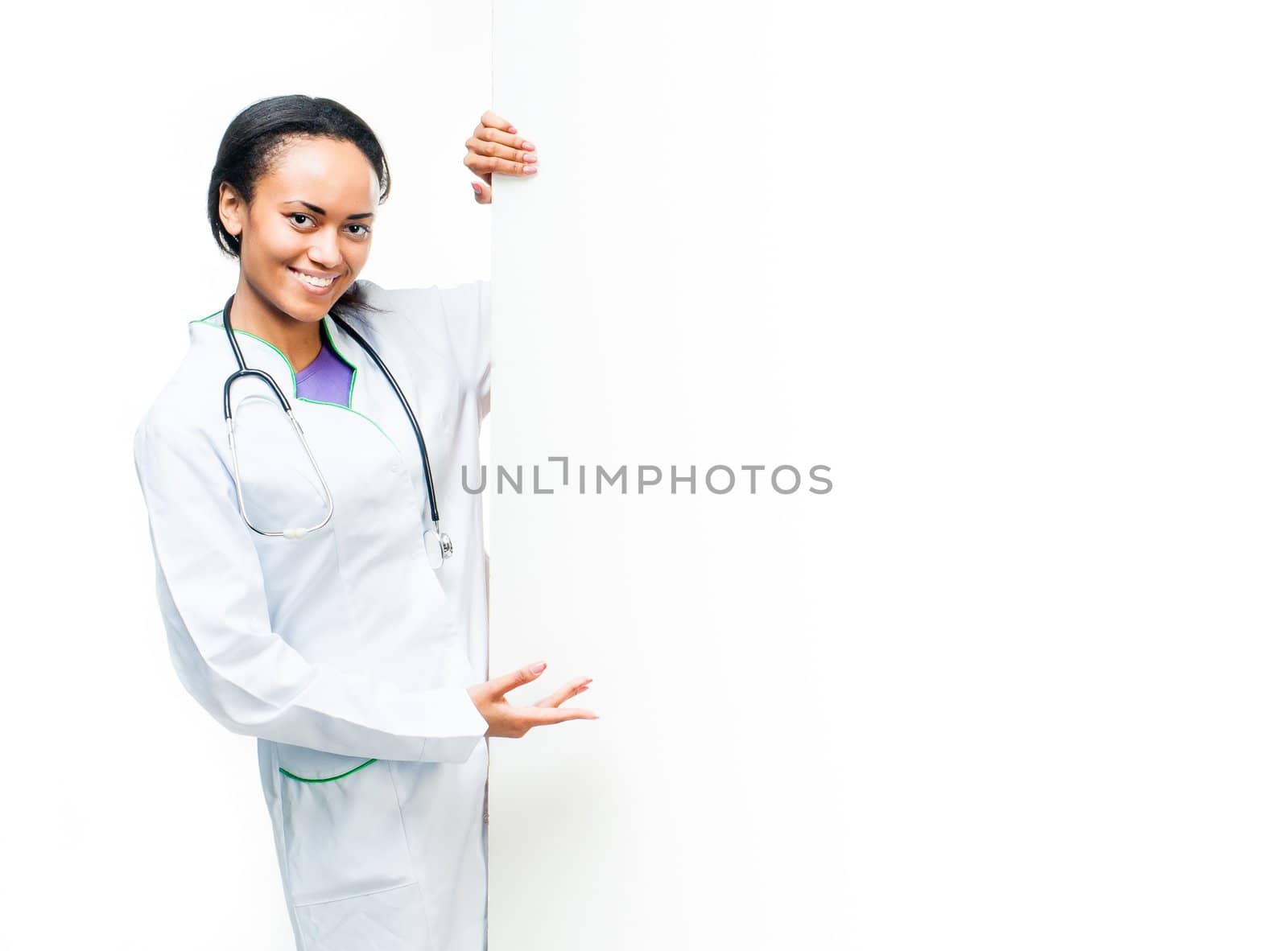 attractive female doctor with board. over white background