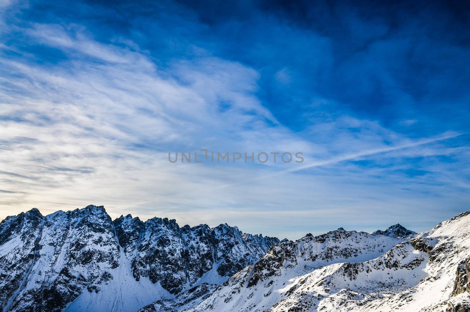 Winter High Tatras mountains landscape with blue cloudy sky by martinm303