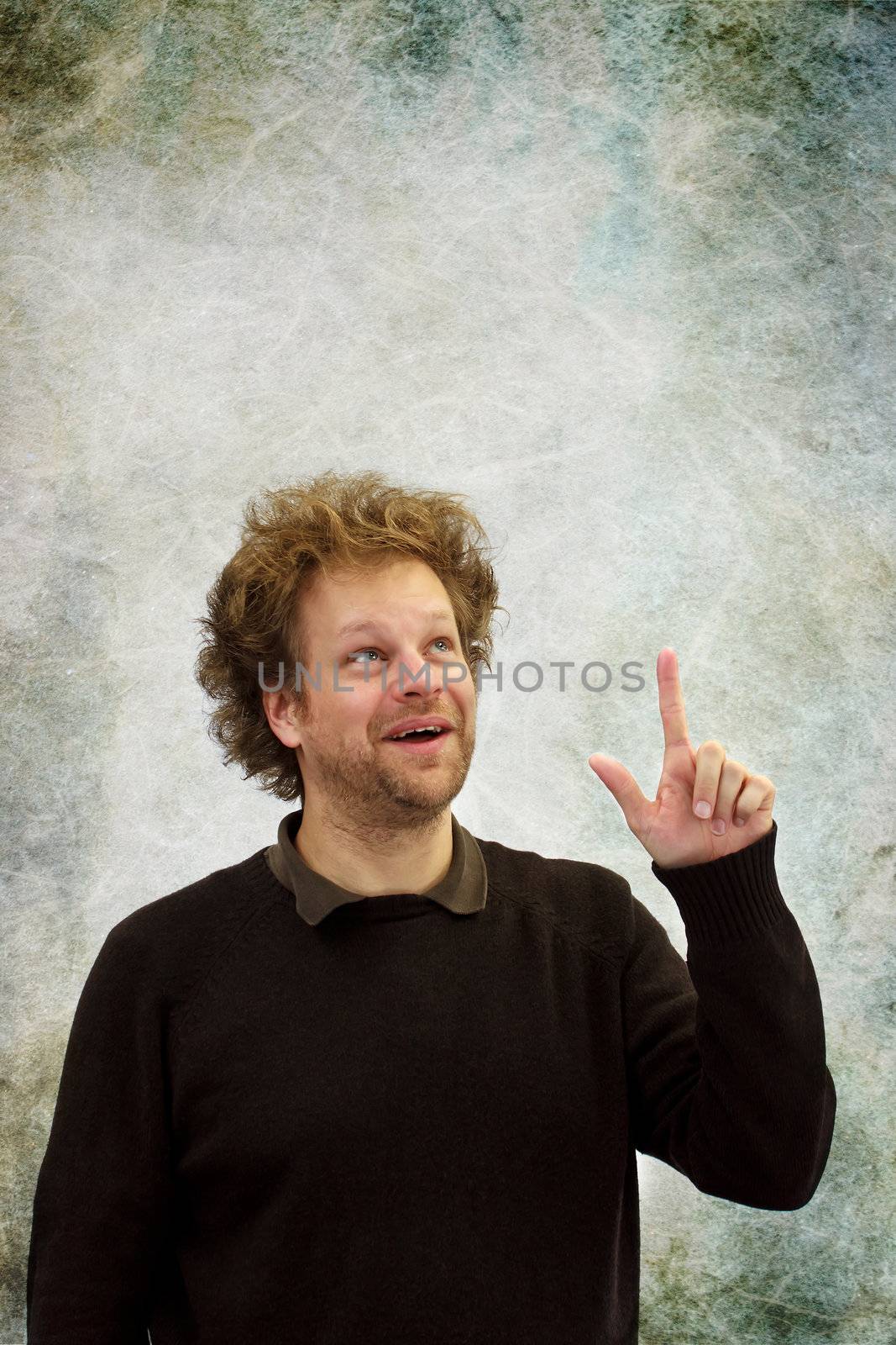 Man pointing upwards