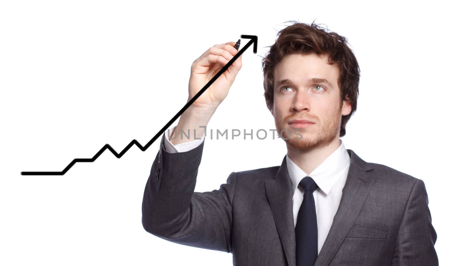 Businessman drawing a graph with black marker