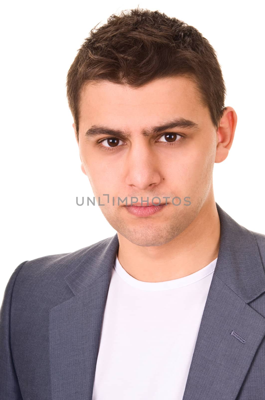 Serious young man in jacket isolated on white background