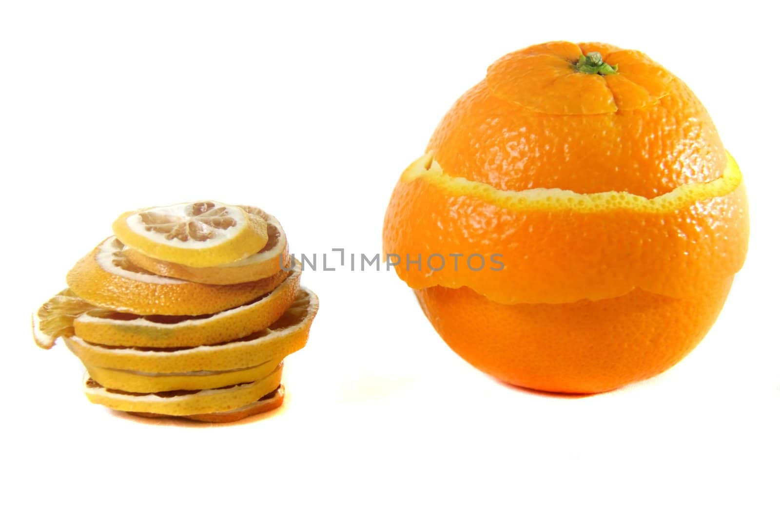 peeling and sliced dried orange  on white isolated background