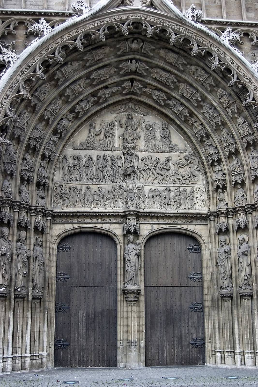 Bronze door entry to famous Vrouwekathedraal - Cathedral of our Lady in Antwerp