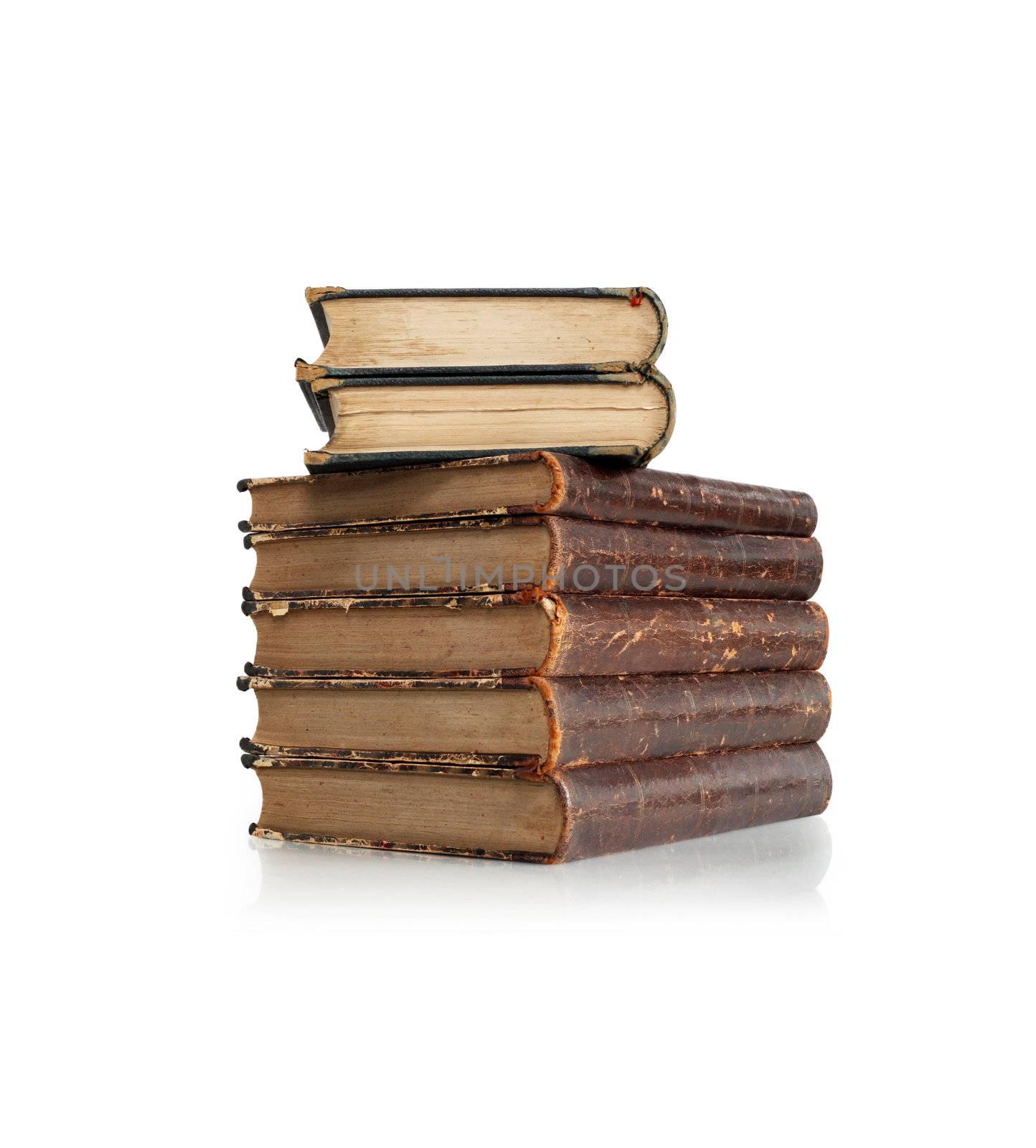 Stack of old books on white background. Clipping path is included