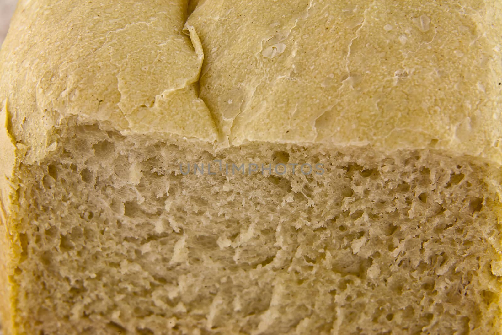 Closeup of home-made white bread by renegadewanderer