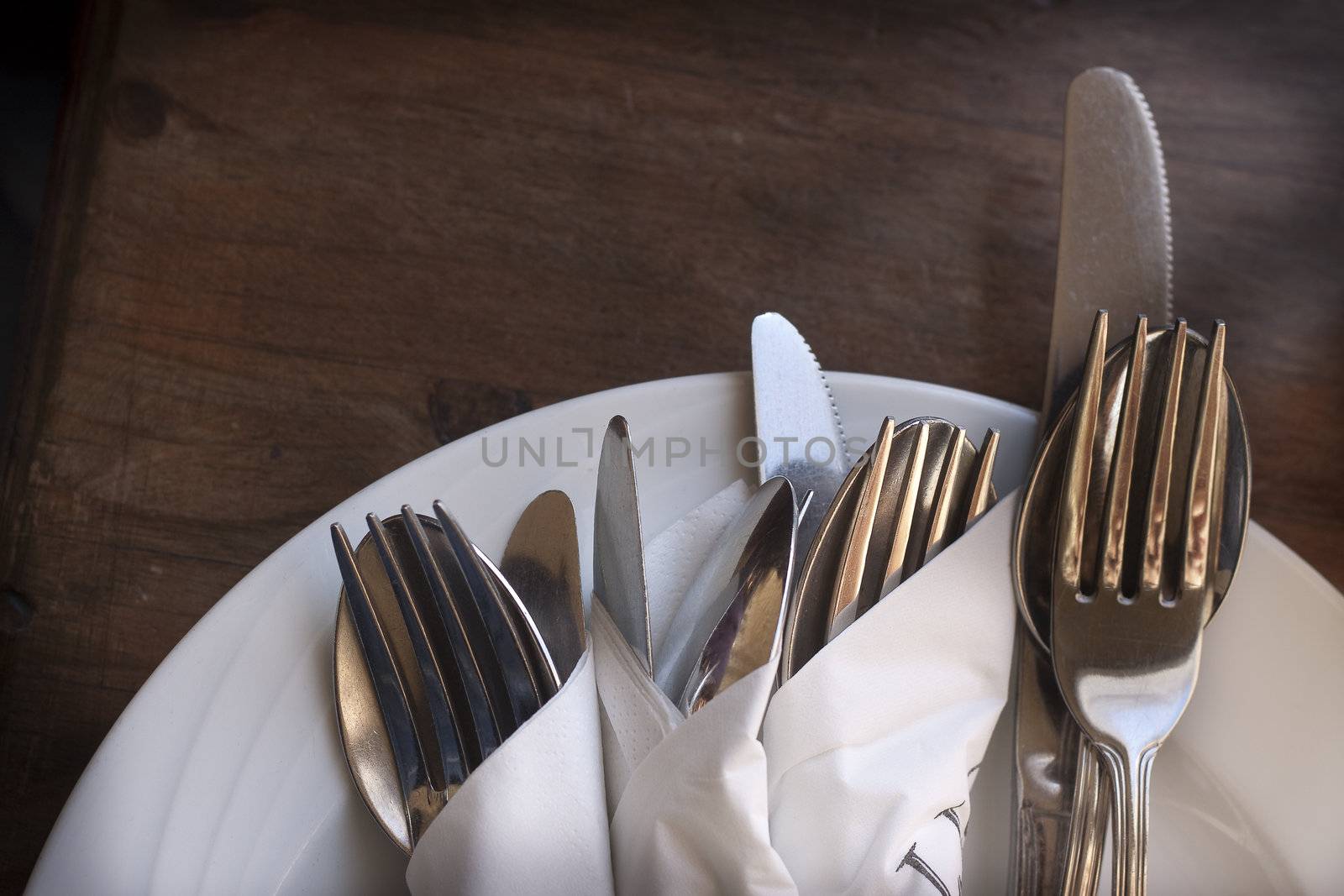 Cutlery on plate by annems