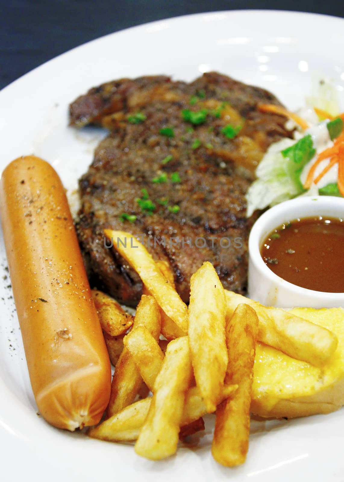 Lamb steak with black pepper on dish