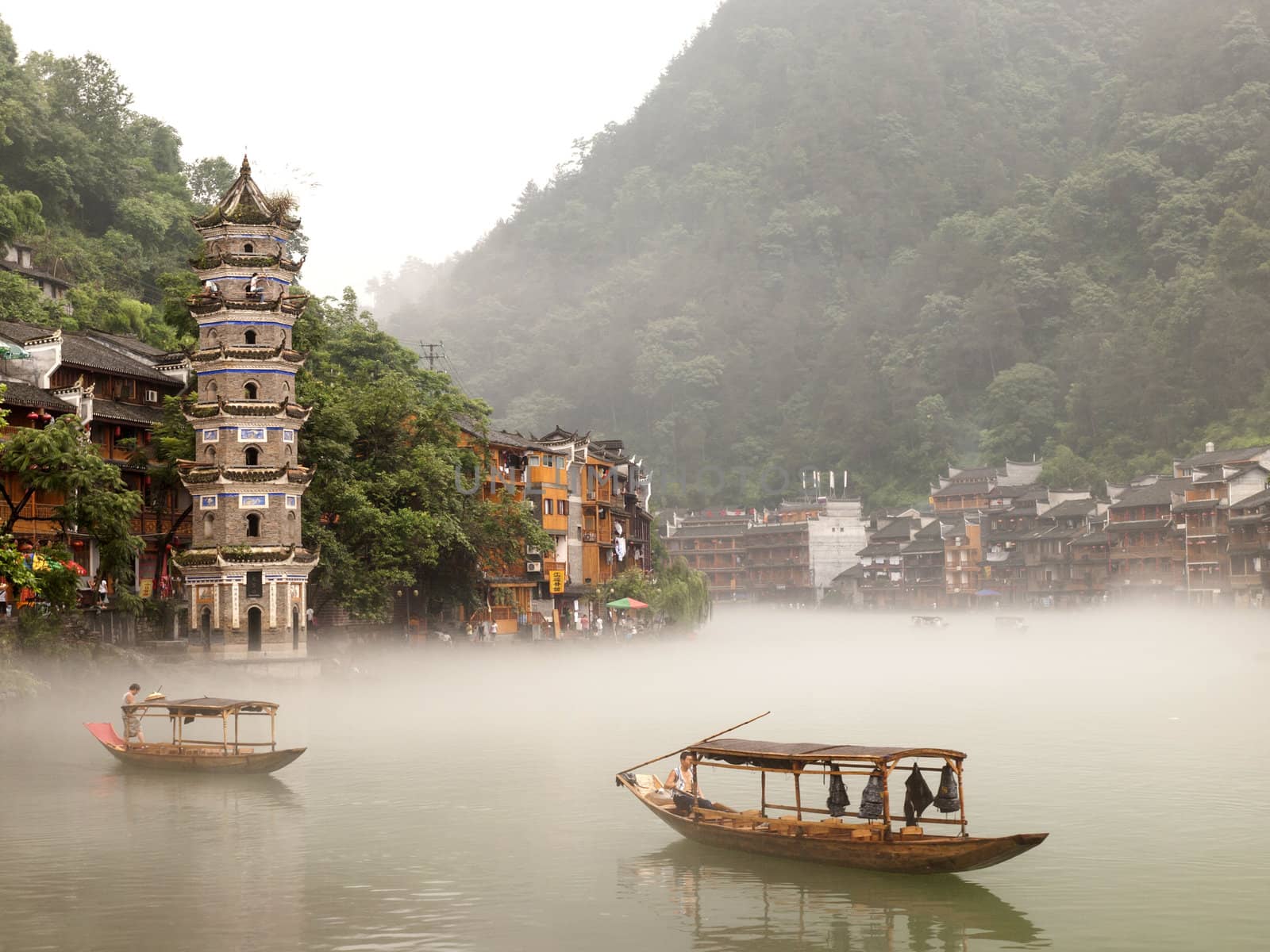 HUNAN, CHINA - JULY 7: View of Tuojiang River on July 7, 2010 in Fenghuang county, China. The ancient town of Fenghuang was added to the UNESCO World Heritage Tentative List in the Cultural category.