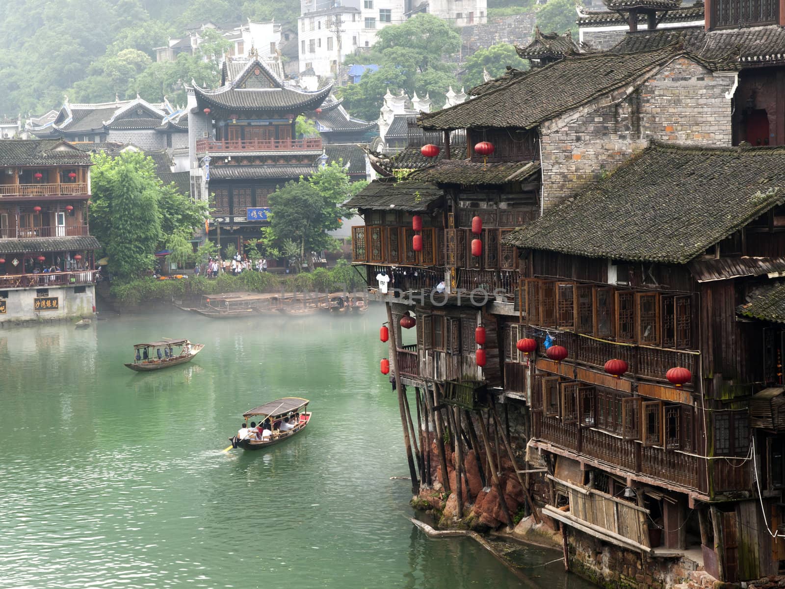 HUNAN, CHINA - JULY 7: View of Tuojiang River on July 7, 2010 in Fenghuang county, China. The ancient town of Fenghuang was added to the UNESCO World Heritage Tentative List in the Cultural category.