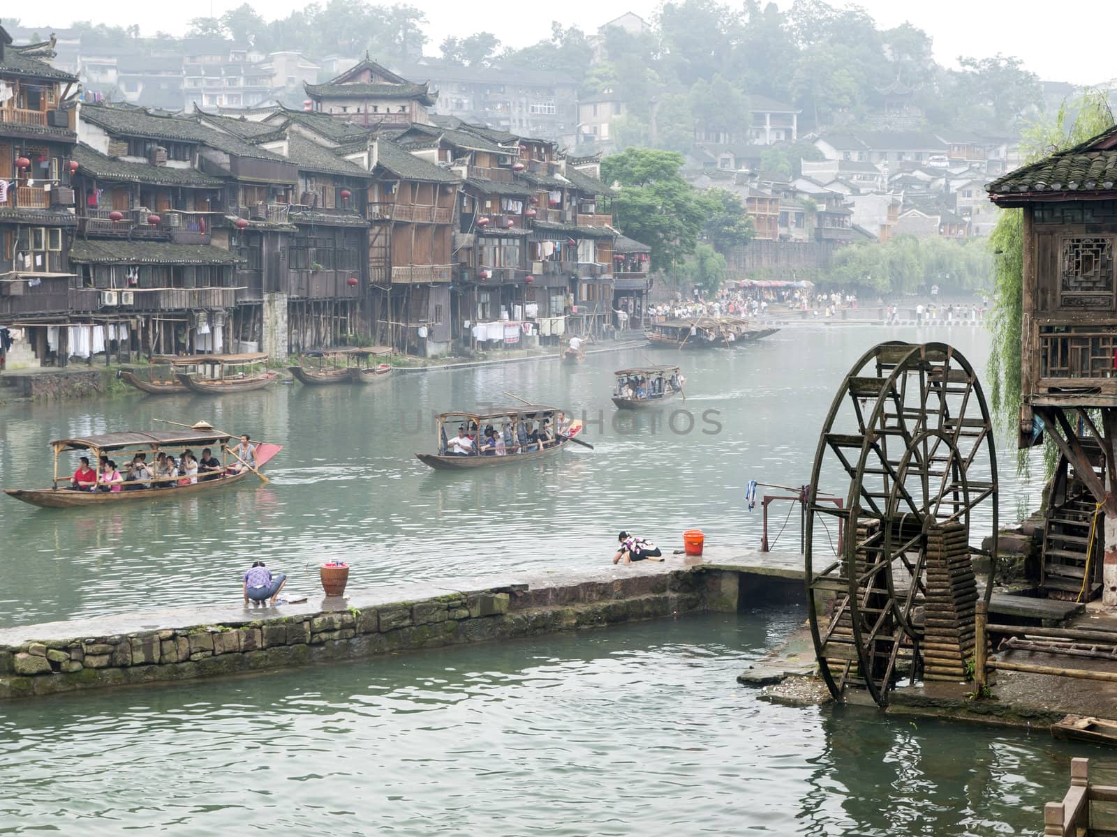 HUNAN, CHINA - JULY 7: View of Tuojiang River on July 7, 2010 in Fenghuang county, China. The ancient town of Fenghuang was added to the UNESCO World Heritage Tentative List in the Cultural category.