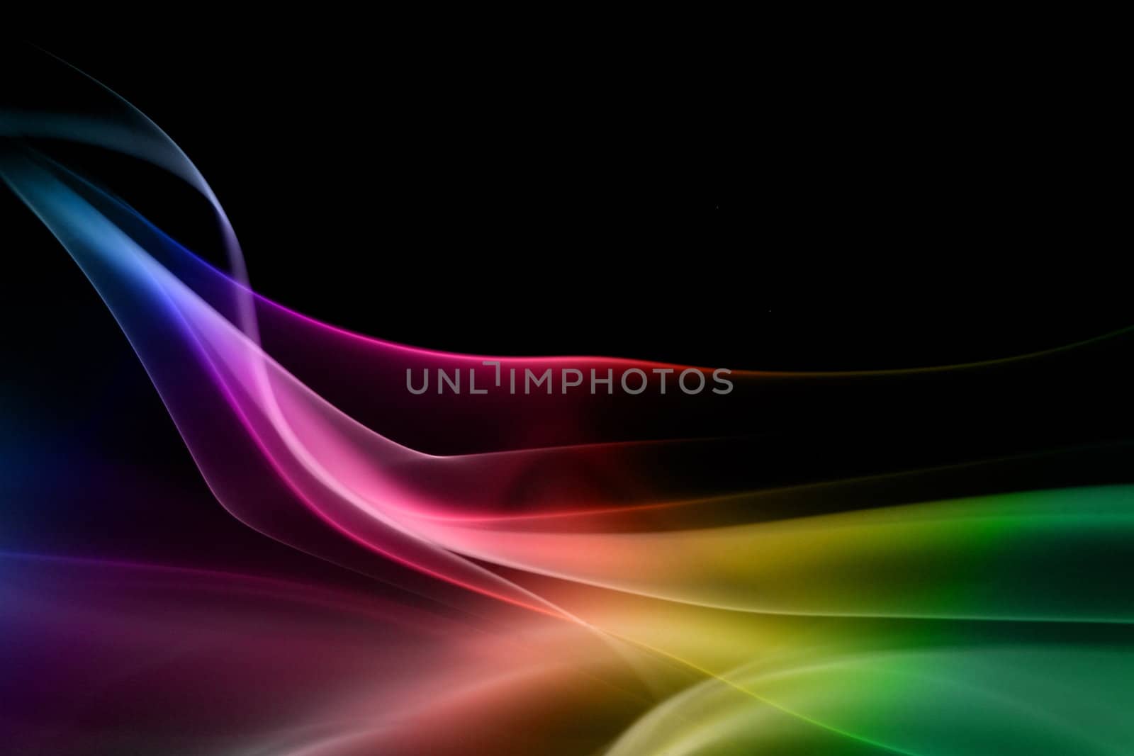 Multicolored smoke in black background