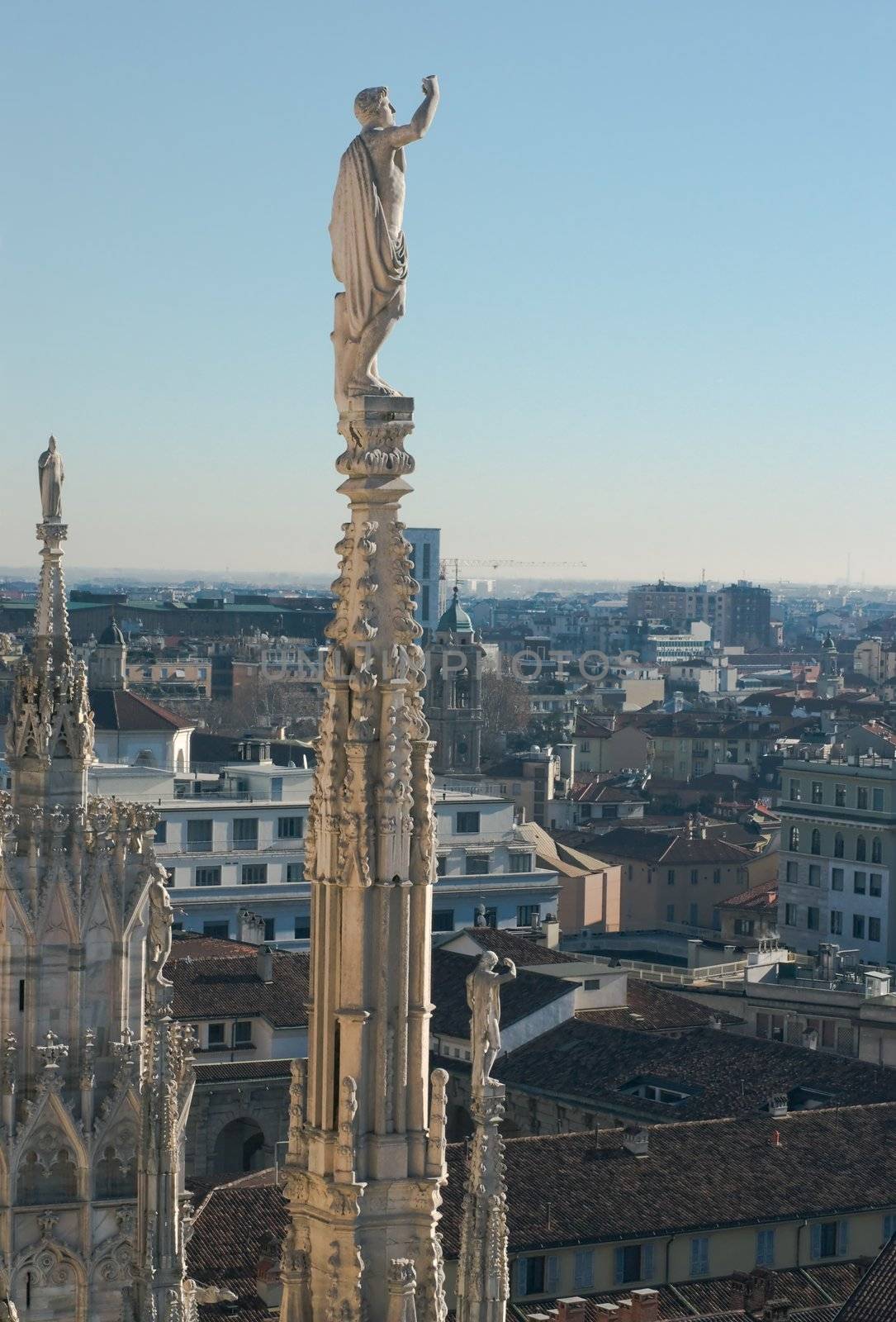 Statues of the Duomo in Milan on a winter evening